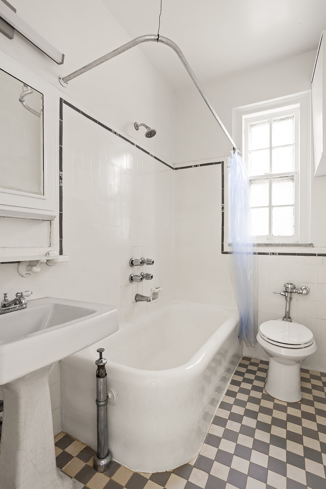 33-39 80th Street, Unit 2A Queens, NY 11372 - Photo 9 of 19 a white bath tub sitting next to a white sink