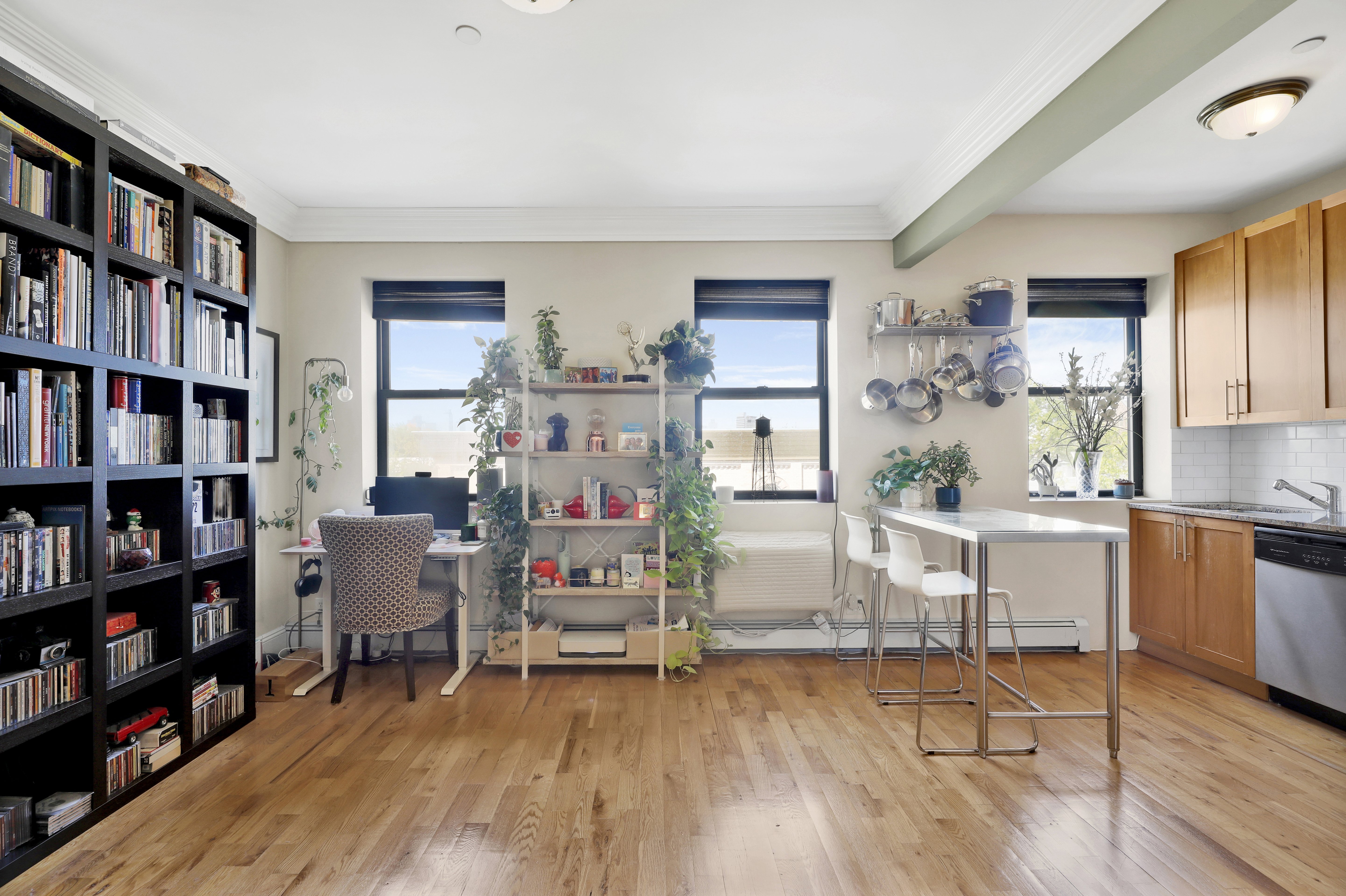 36 Russell Street, Unit 22 Brooklyn, NY 11222 - Photo 7 of 27 a living room with furniture and a wooden floor