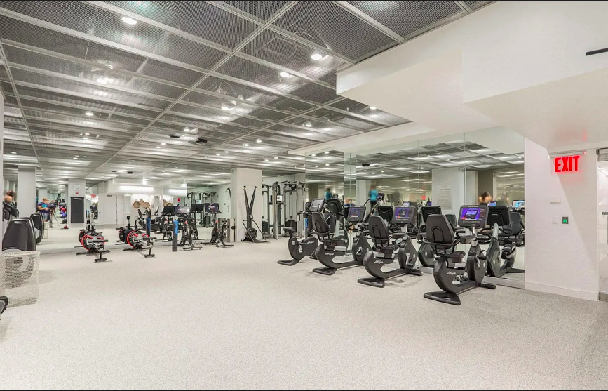 200 East 66th Street, Unit C704 Manhattan, NY 10065 - Photo 13 of 23 a view of a garage with a bike and car