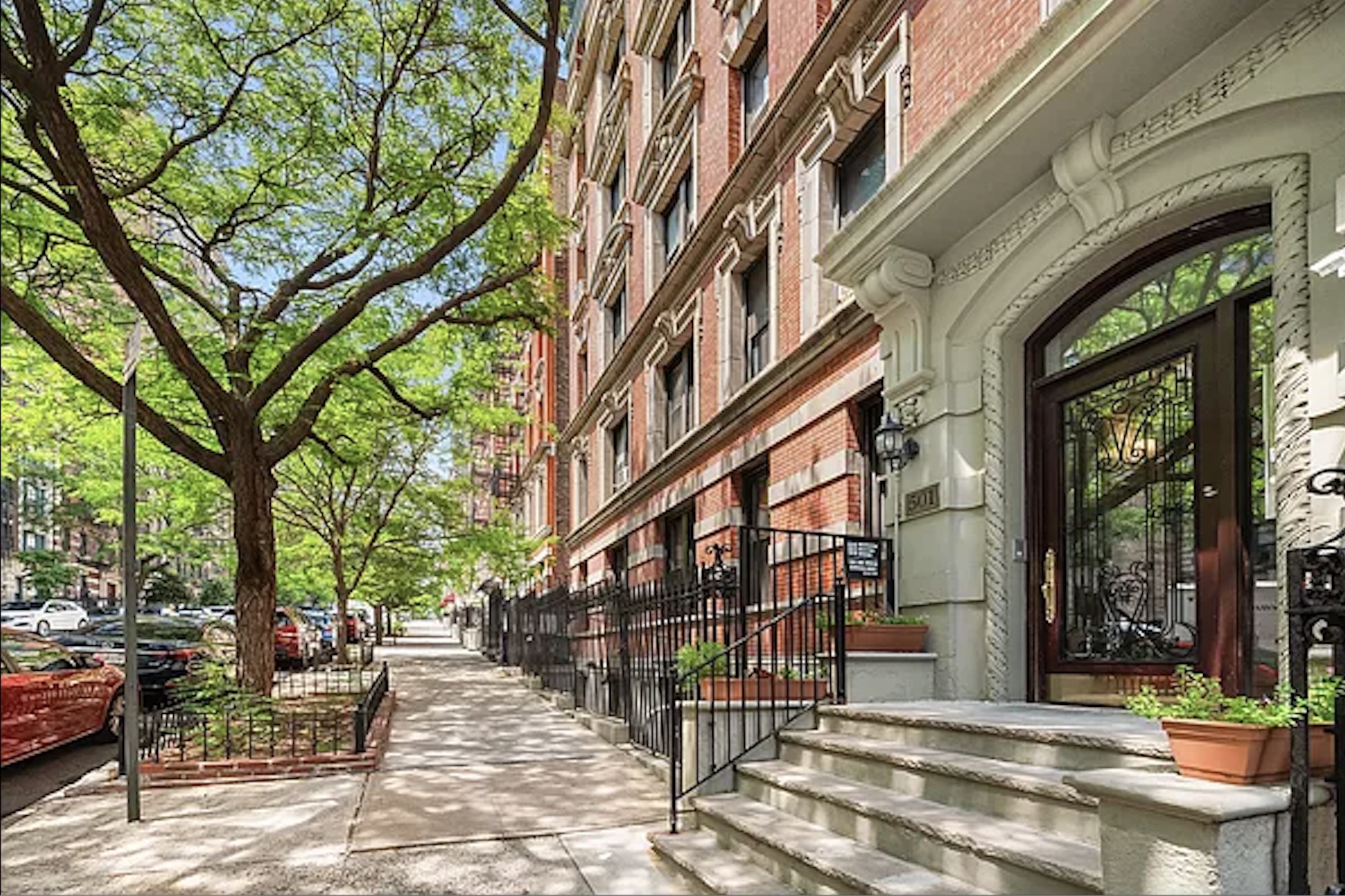 501 West 122nd Street, Unit A2 Manhattan, NY 10027 - Photo 9 of 21 a view of a building with a bench in patio