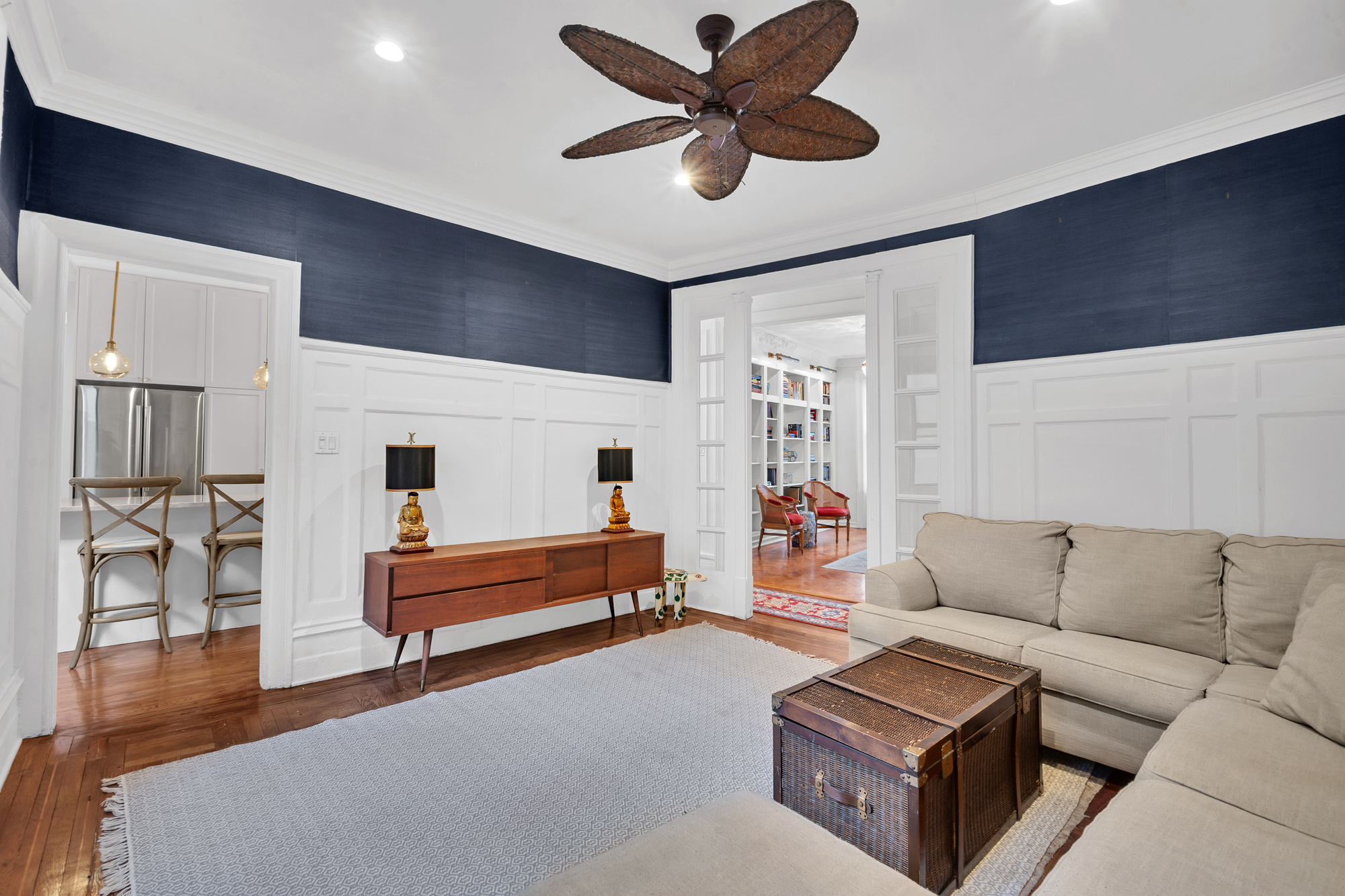 47 Fort Washington Avenue, Unit 55 Manhattan, NY 10032 - Photo 3 of 20 a living room with furniture and a wooden floor