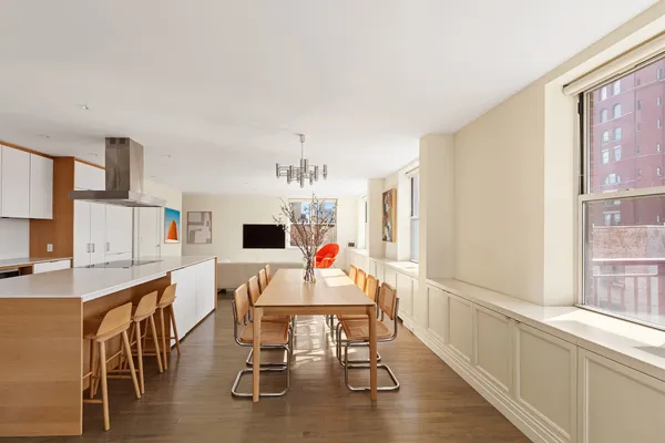 a kitchen with a sink cabinets and window