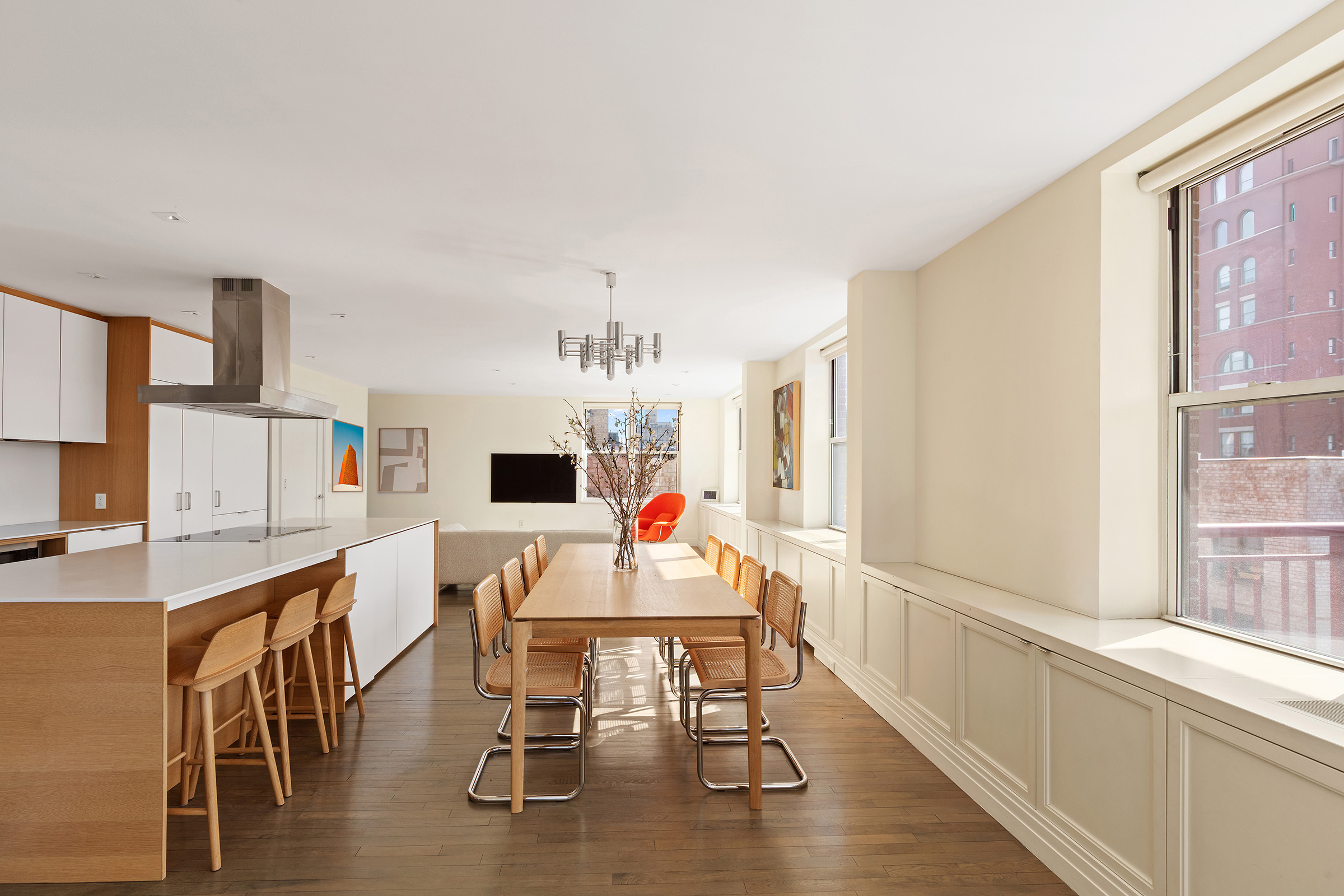 296 West 10th Street, Unit 8S Manhattan, NY 10014 - Photo 5 of 12 a living room with furniture and a wooden floor