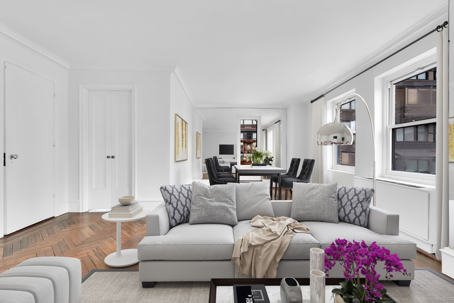 465 Park Avenue, Unit 26C Manhattan, NY 10022 - Photo 3 of 10 a living room with furniture flowerpot and a window