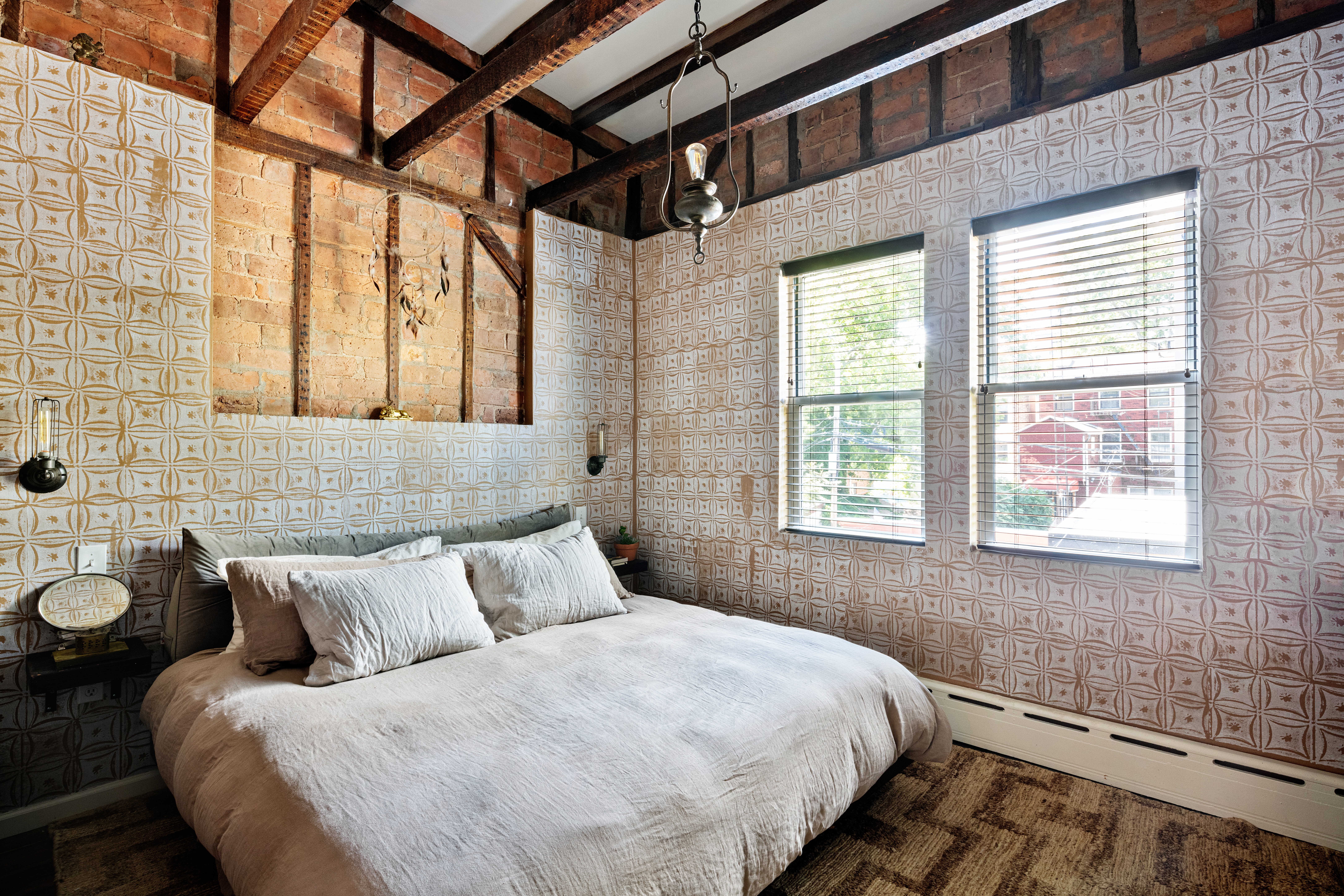 111 Powers Street Brooklyn, NY 11211 - Photo 11 of 16 a bedroom with a bed and a window