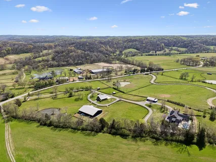 a view of a garden with houses