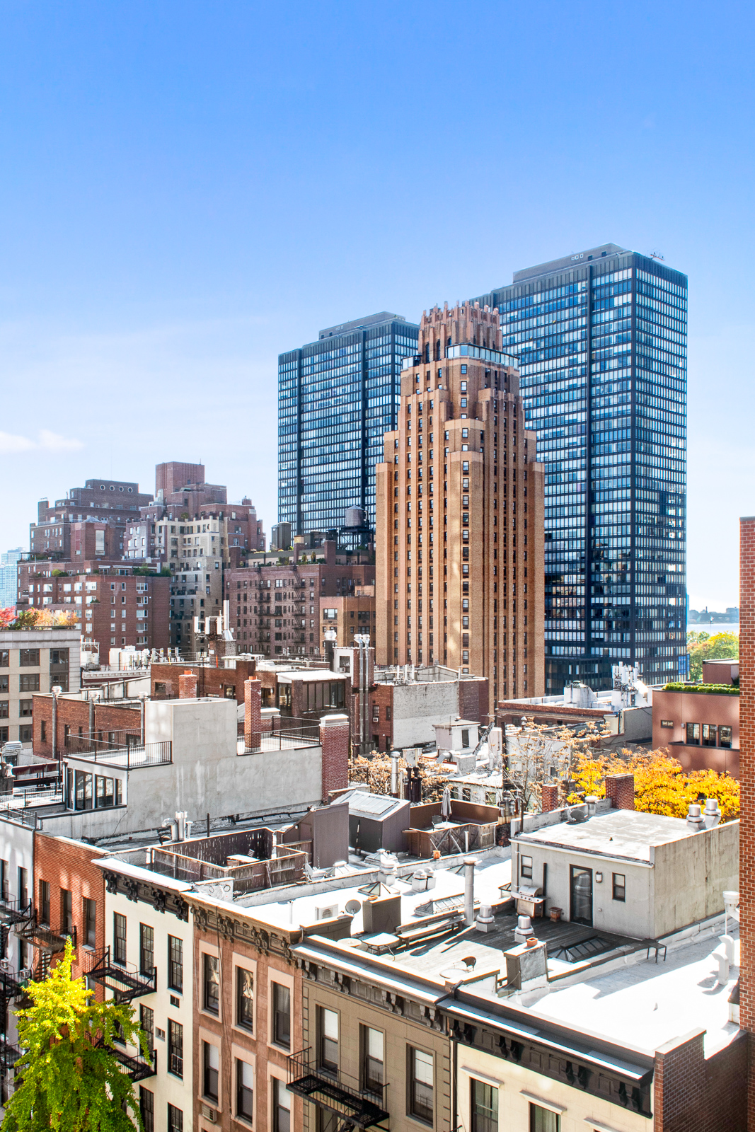 335 East 51st Street, Unit 10C Manhattan, NY 10022 - Photo 6 of 9 a view of city with tall buildings