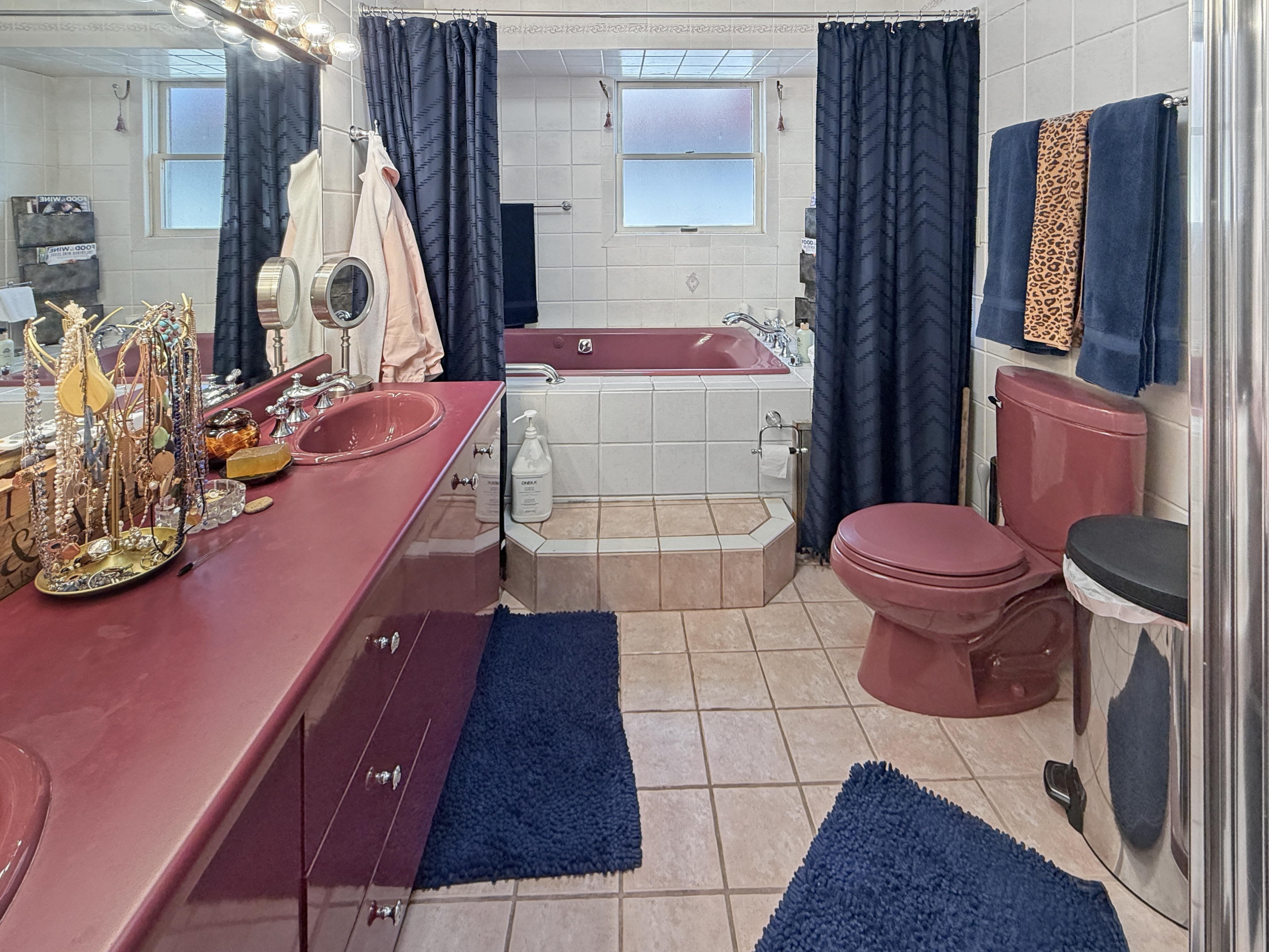 5007 Surf Avenue Brooklyn, NY 11224 - Photo 13 of 37 a bathroom with a sink toilet and mirror