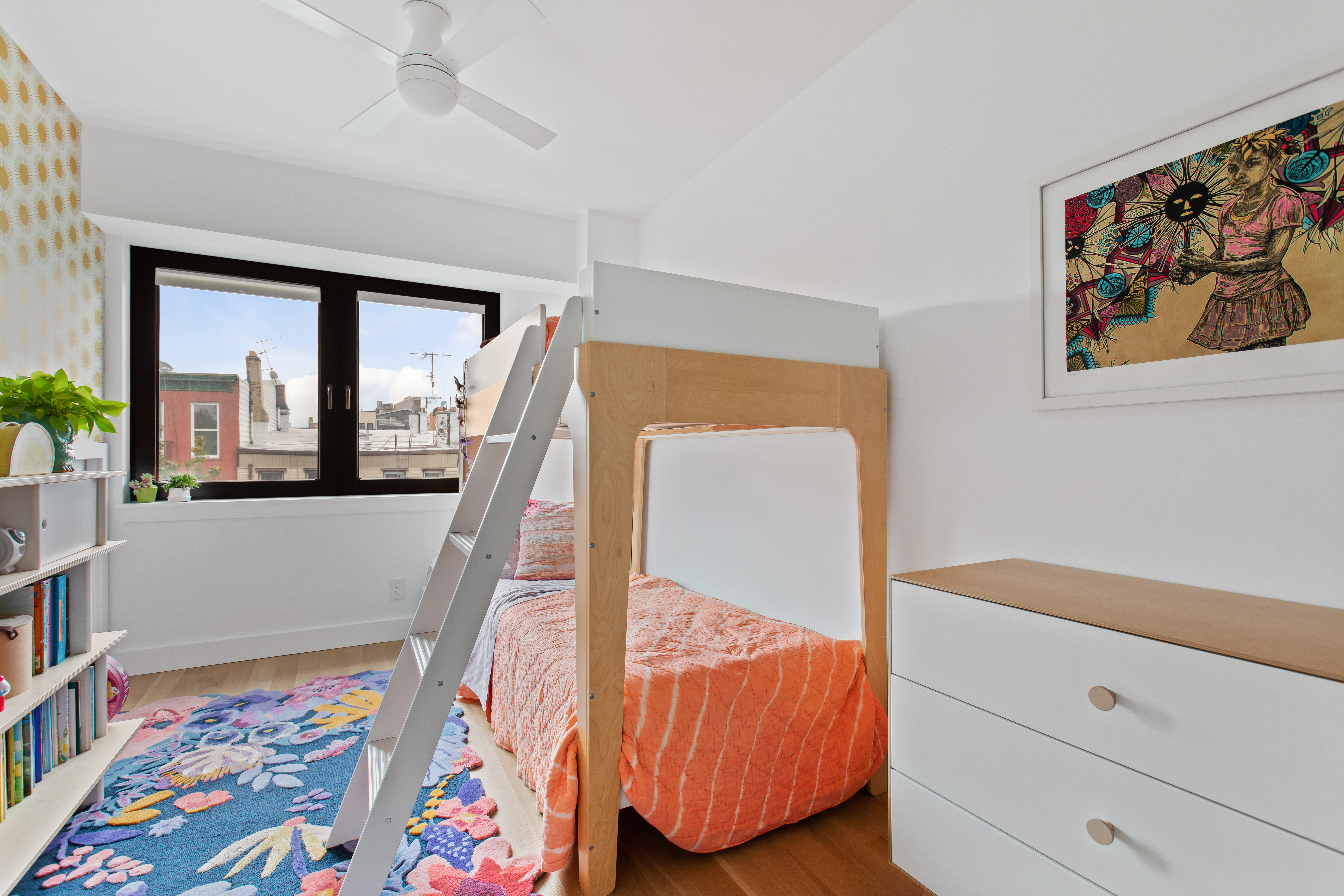 42 Sharon Street Brooklyn, NY 11211 - Photo 17 of 28 a living room with furniture and a baby crib