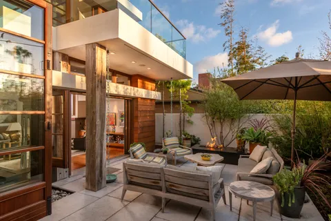 a view of a living room and bathroom