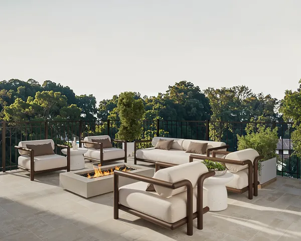 a view of a house with backyard porch and sitting area