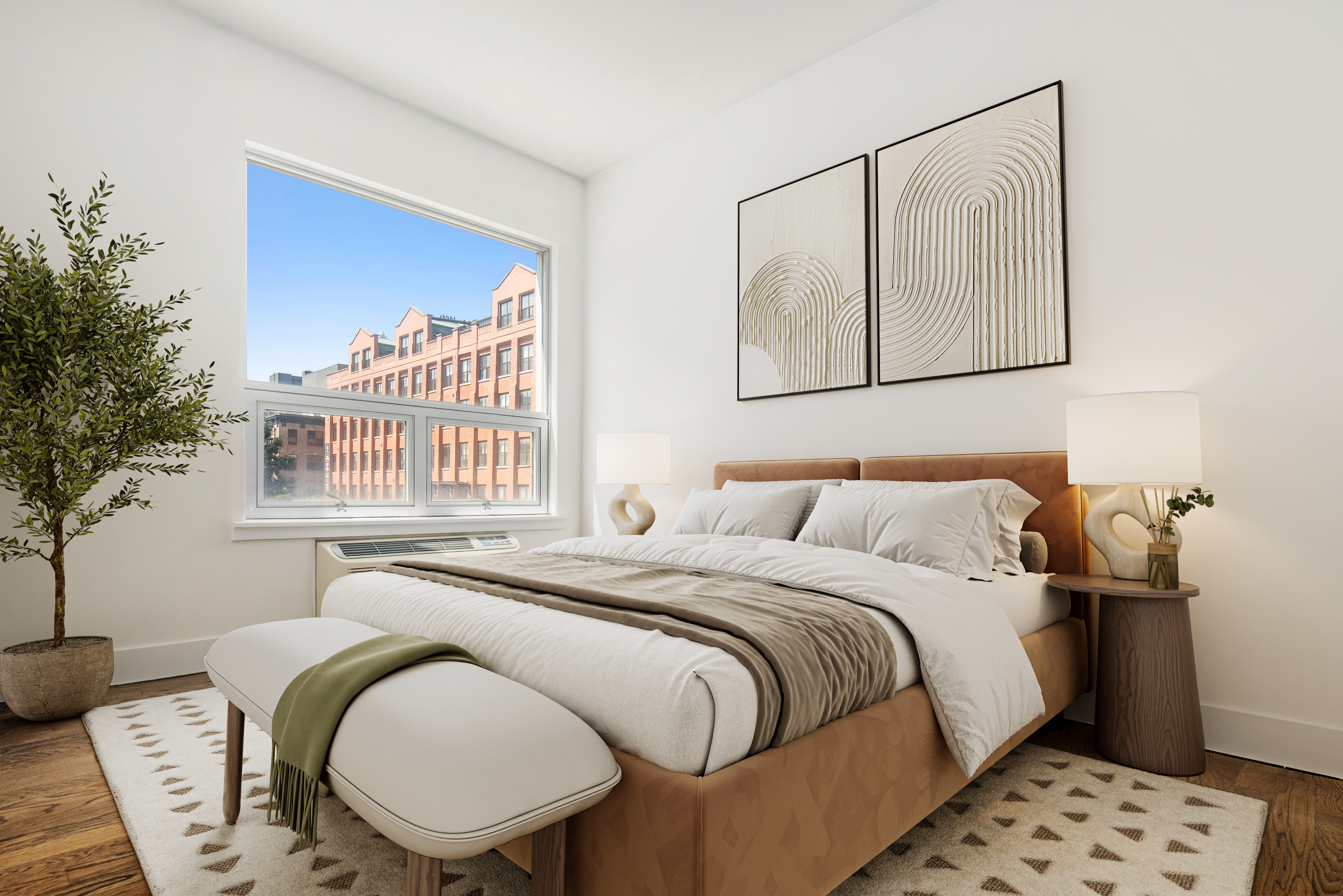 15 Roebling Street, Unit 2B Brooklyn, NY 11211 - Photo 3 of 9 a bedroom with a bed and a painting on the wall