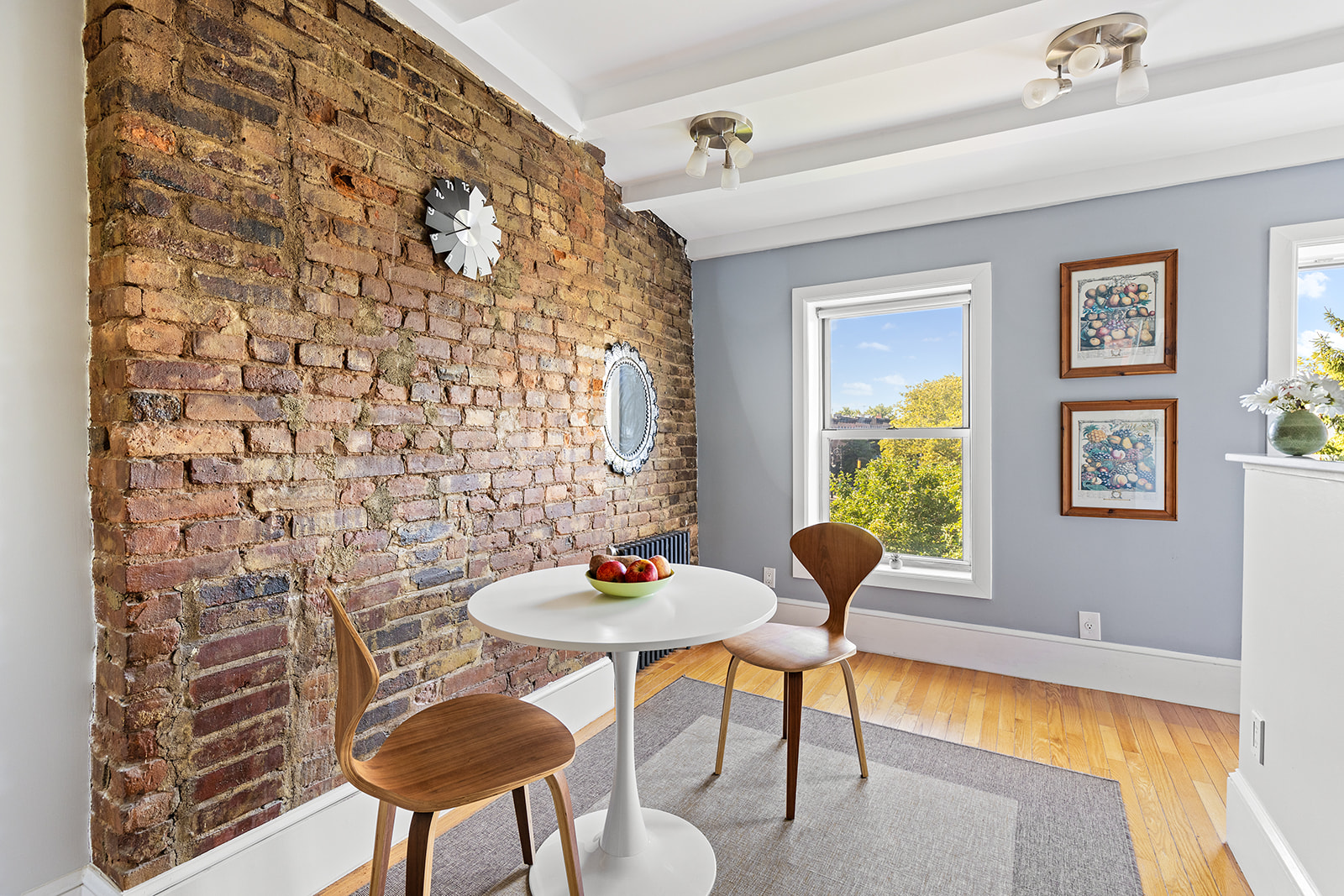 334 Union Street, Unit 3 Brooklyn, NY 11231 - Photo 2 of 10 a view of a dining room with furniture and a window