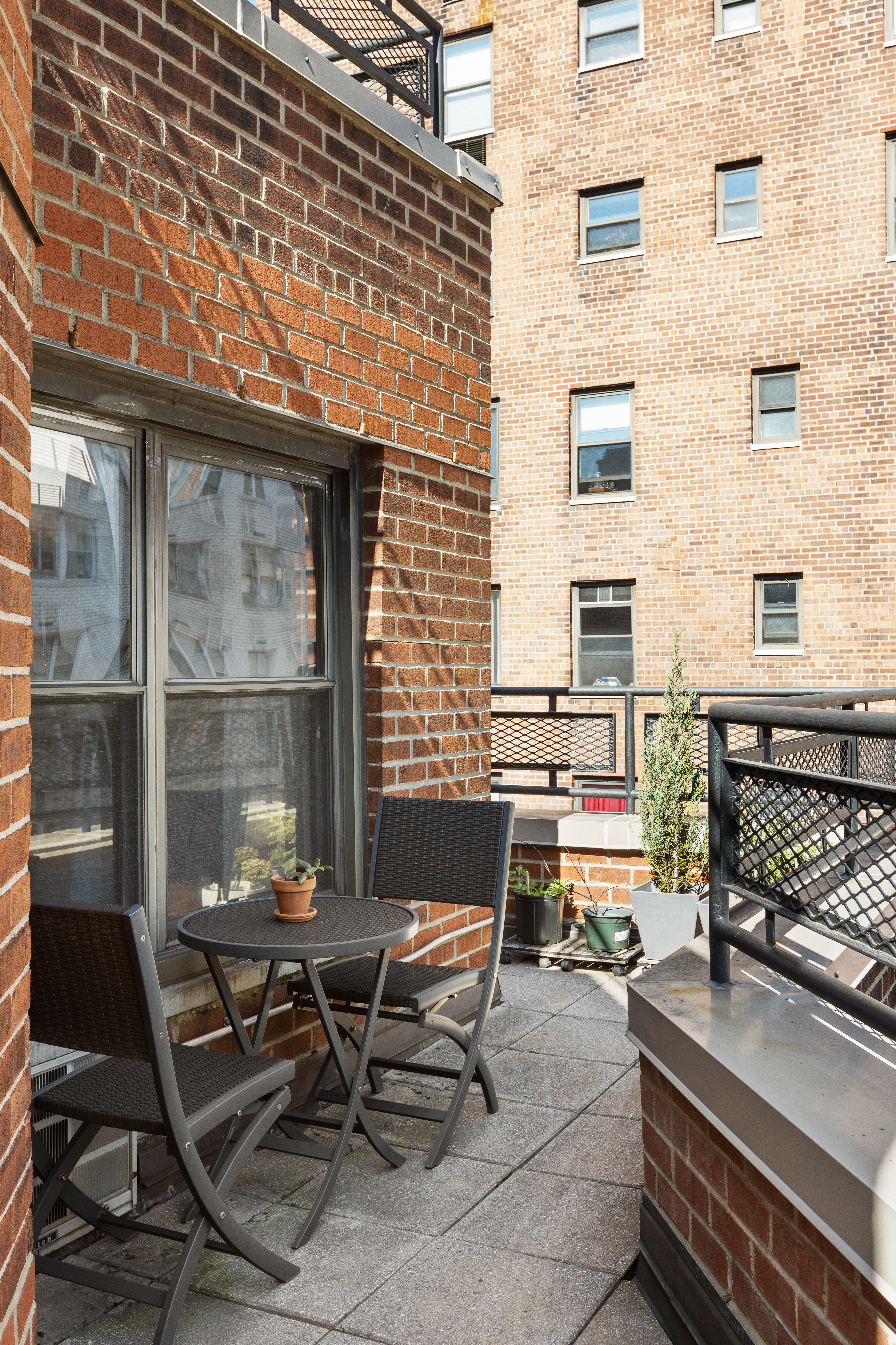 210 East 36th Street, Unit PHC Manhattan, NY 10016 - Photo 7 of 13 a building outdoor space with patio furniture