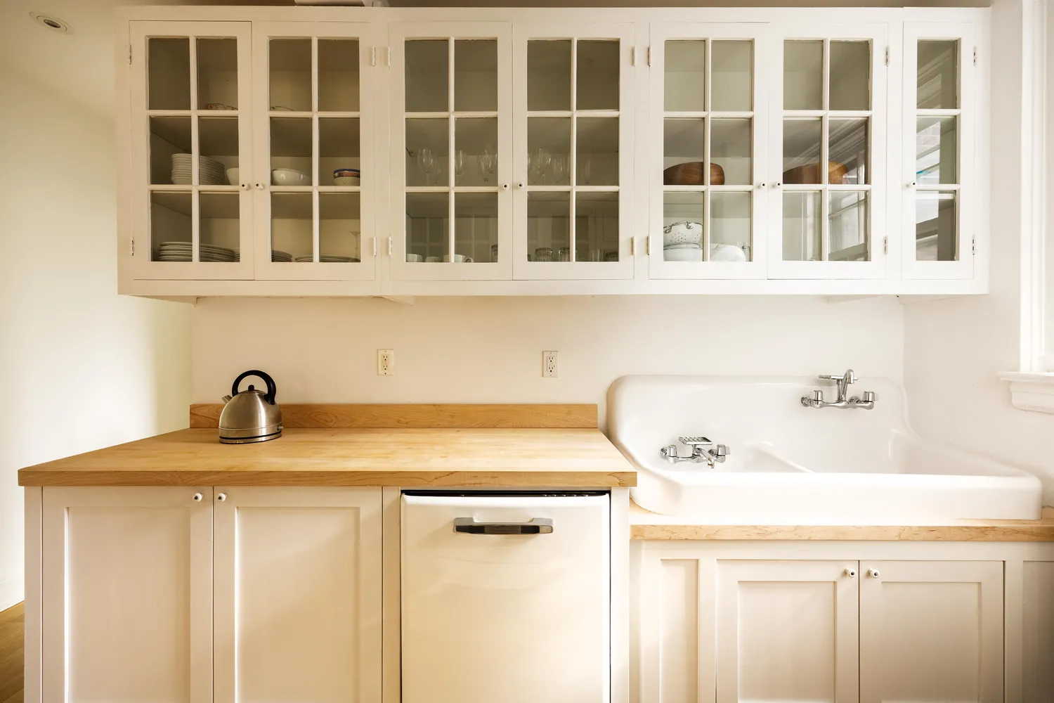 a bathroom with a sink and a window