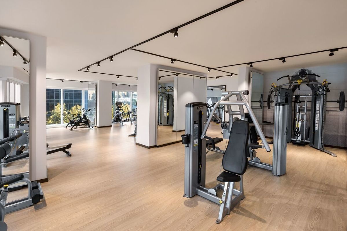 1 West End Avenue, Unit 27D Manhattan, NY 10023 - Photo 12 of 21 a view of a room with gym equipment