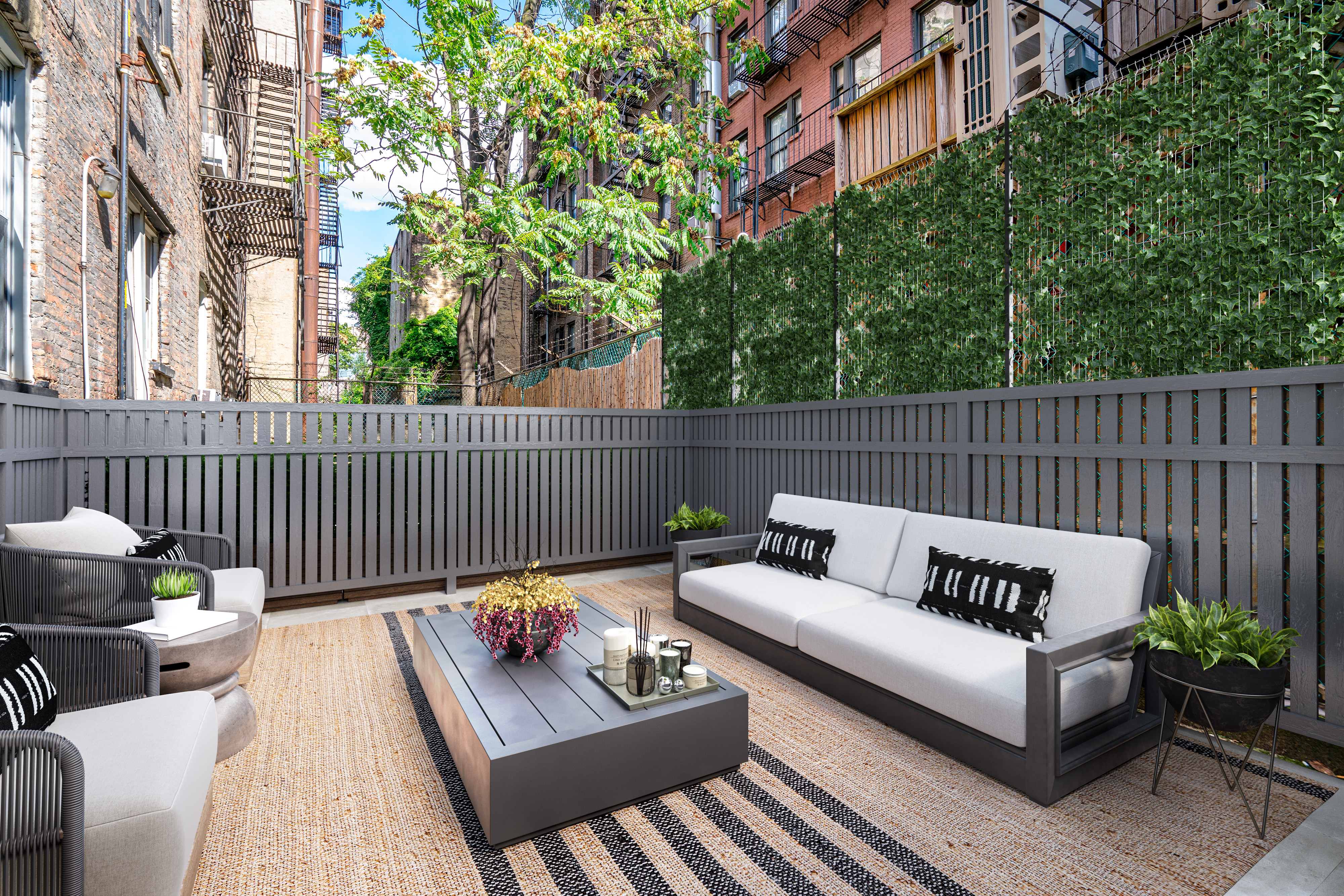 210 West 10th Street, Unit 1C Manhattan, NY 10014 - Photo 1 of 6 a view of a roof deck with couches