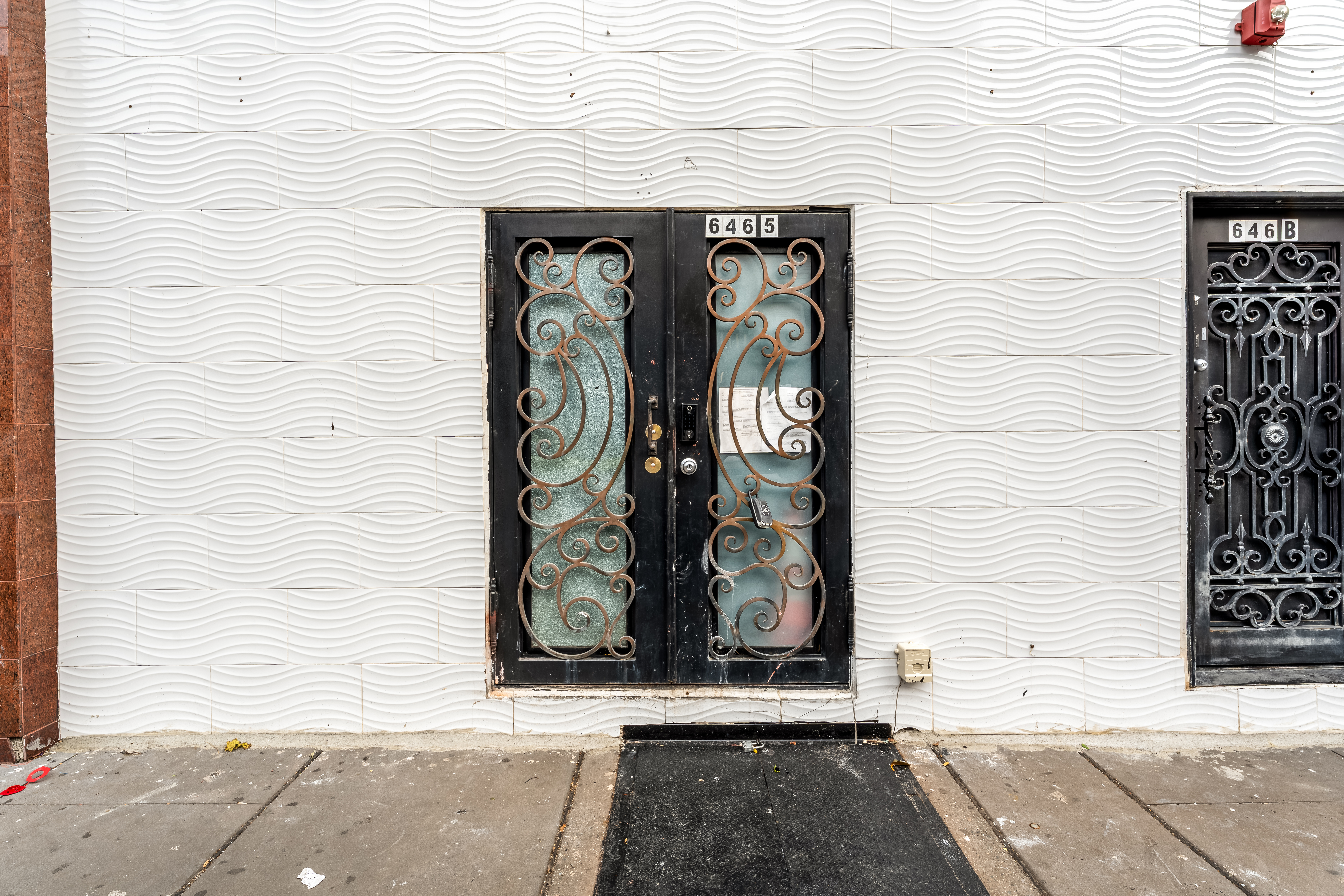 646 Newark Avenue, Unit COMMERCIAL Jersey City, NJ 07306 - Photo 32 of 35 a view of a door with wooden wall