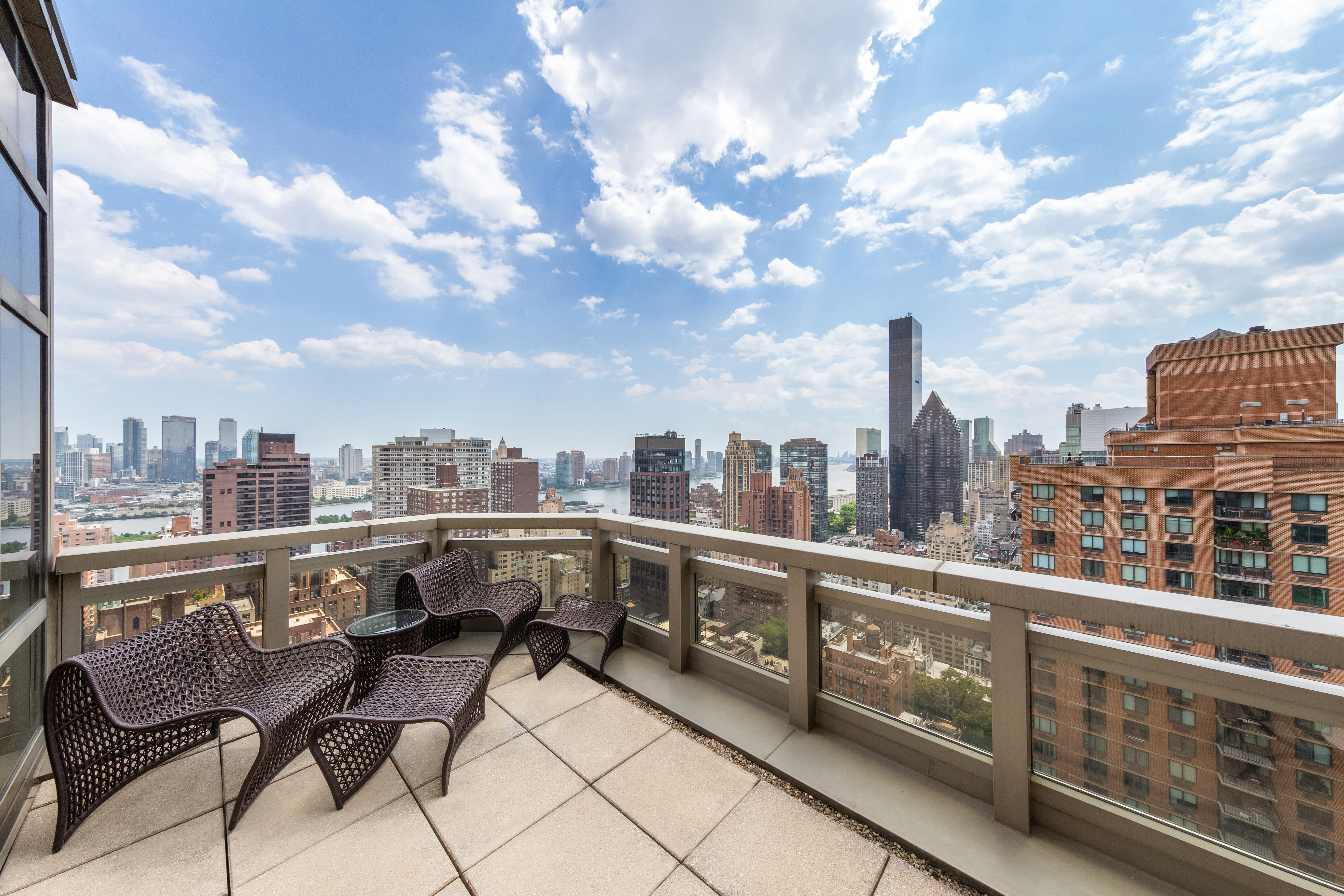 300 East 55th Street, Unit PHC Manhattan, NY 10022 - Photo 18 of 21 a view of a city with furniture