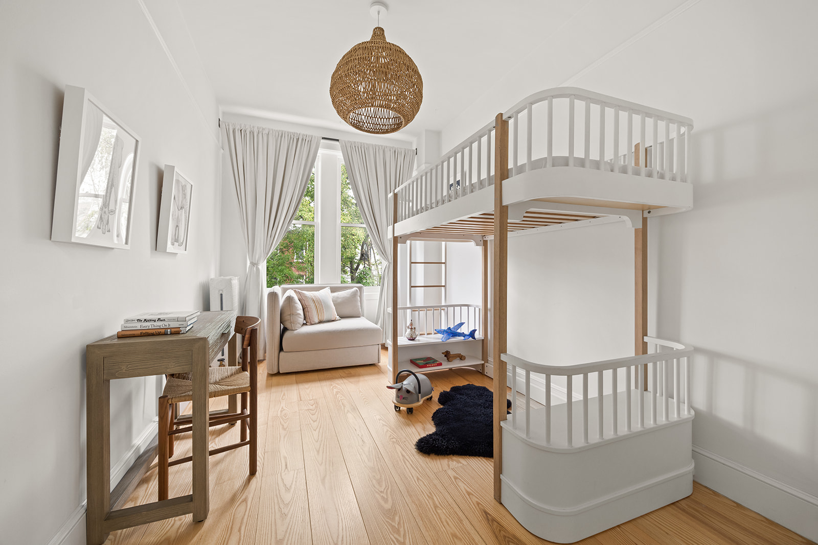 125 Rutland Road Brooklyn, NY 11225 - Photo 10 of 22 a living room with furniture a fireplace and a large window