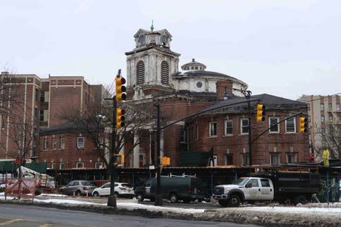 1800 Grand Concourse Bronx, NY 10457 - Photo 2 of 5 a front view of a building with street