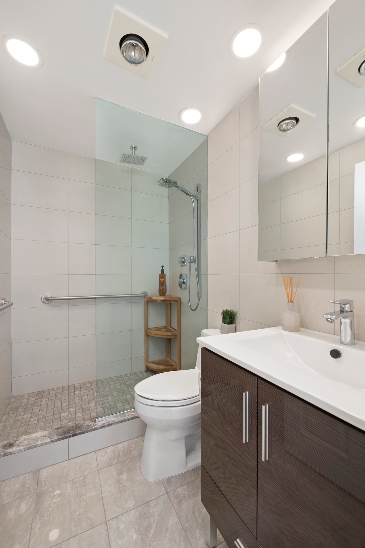 343 East 74th Street, Unit 14K Manhattan, NY 10021 - Photo 6 of 7 a bathroom with a sink toilet and shower
