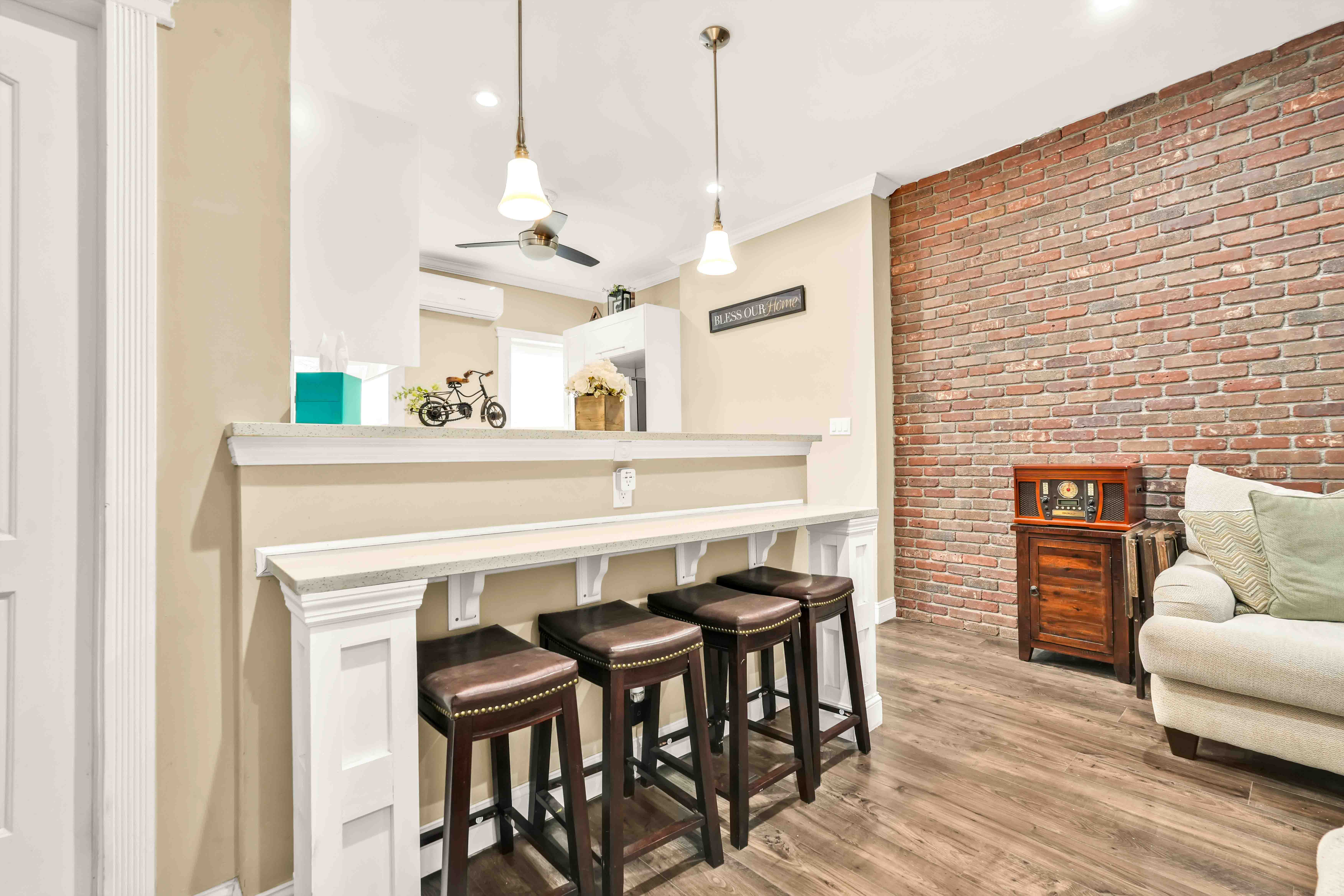 519 Monroe Street Brooklyn, NY 11221 - Photo 9 of 55 a view of a dining room with furniture and wooden floor