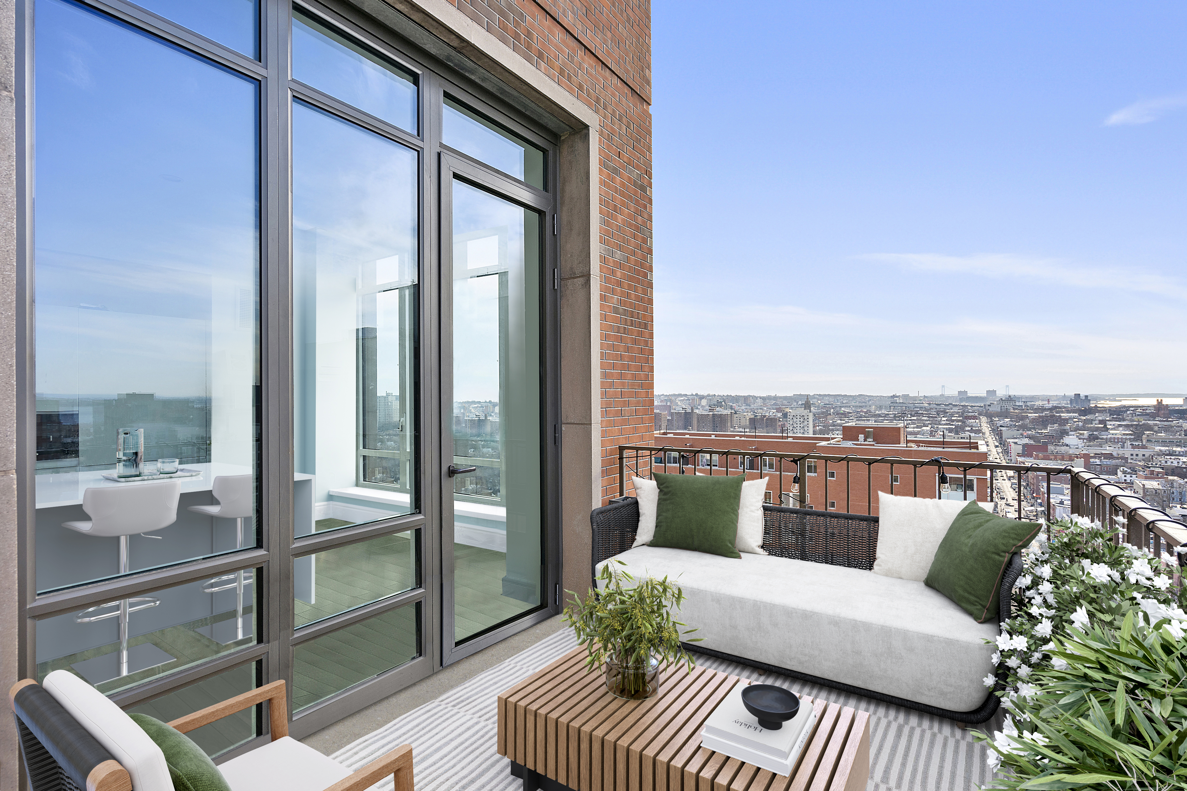 265 State Street, Unit 1601 Brooklyn, NY 11201 - Photo 10 of 14 a balcony with furniture and a potted plant
