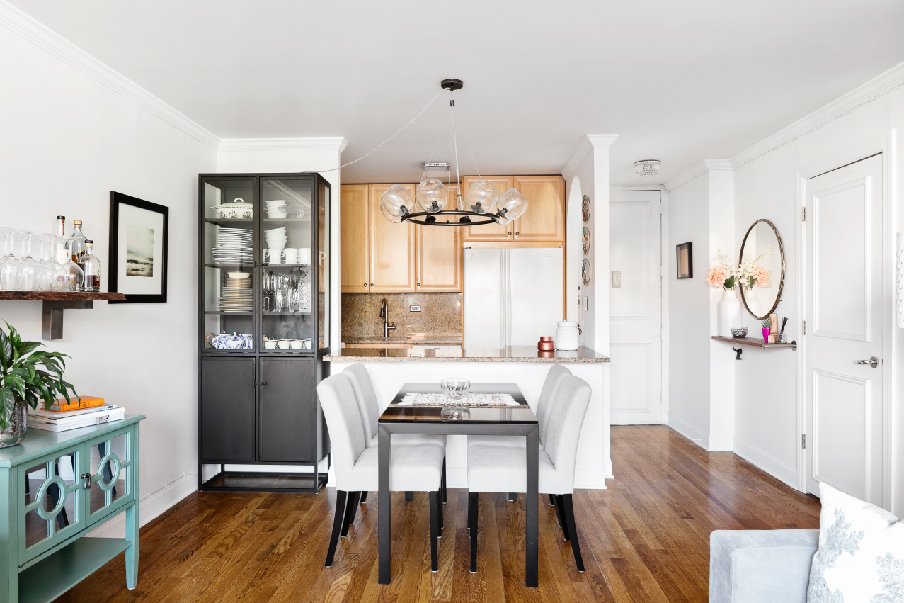 200 East 90th Street, Unit 7A Manhattan, NY 10128 - Photo 2 of 7 a view of a dining room with furniture and window