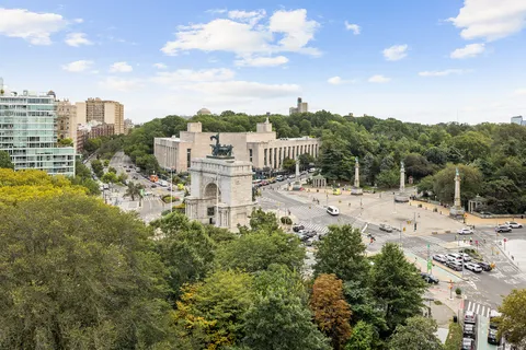 a view of a lake with a city