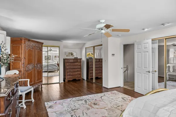 a view of a house with wooden deck