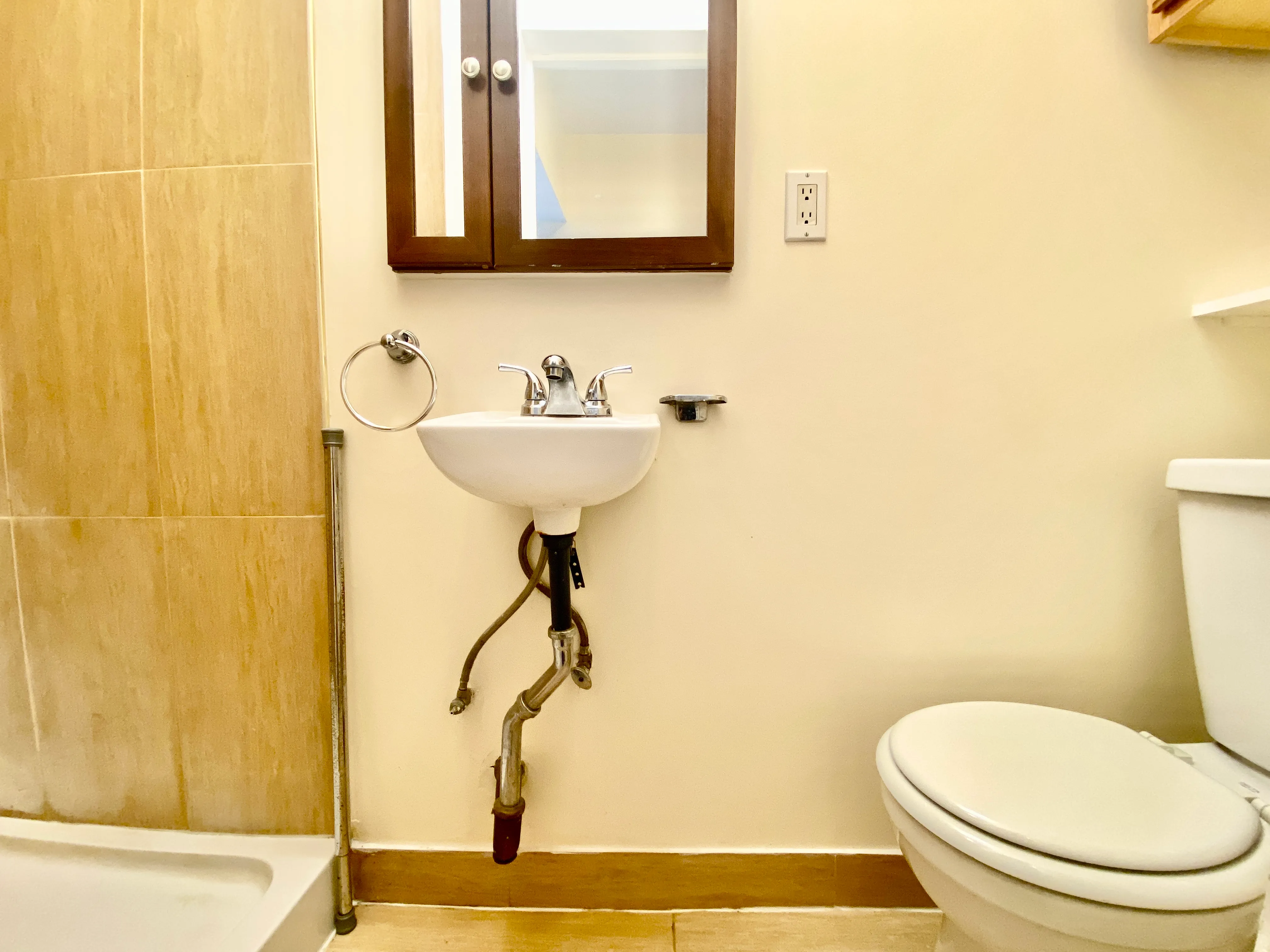 87 Wyckoff Street, Unit 3 Brooklyn, NY 11201 - Photo 9 of 10 a bathroom with a sink toilet and mirror