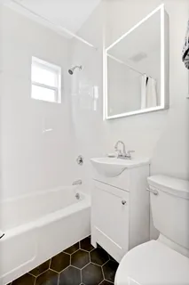 a workspace with furniture and a window