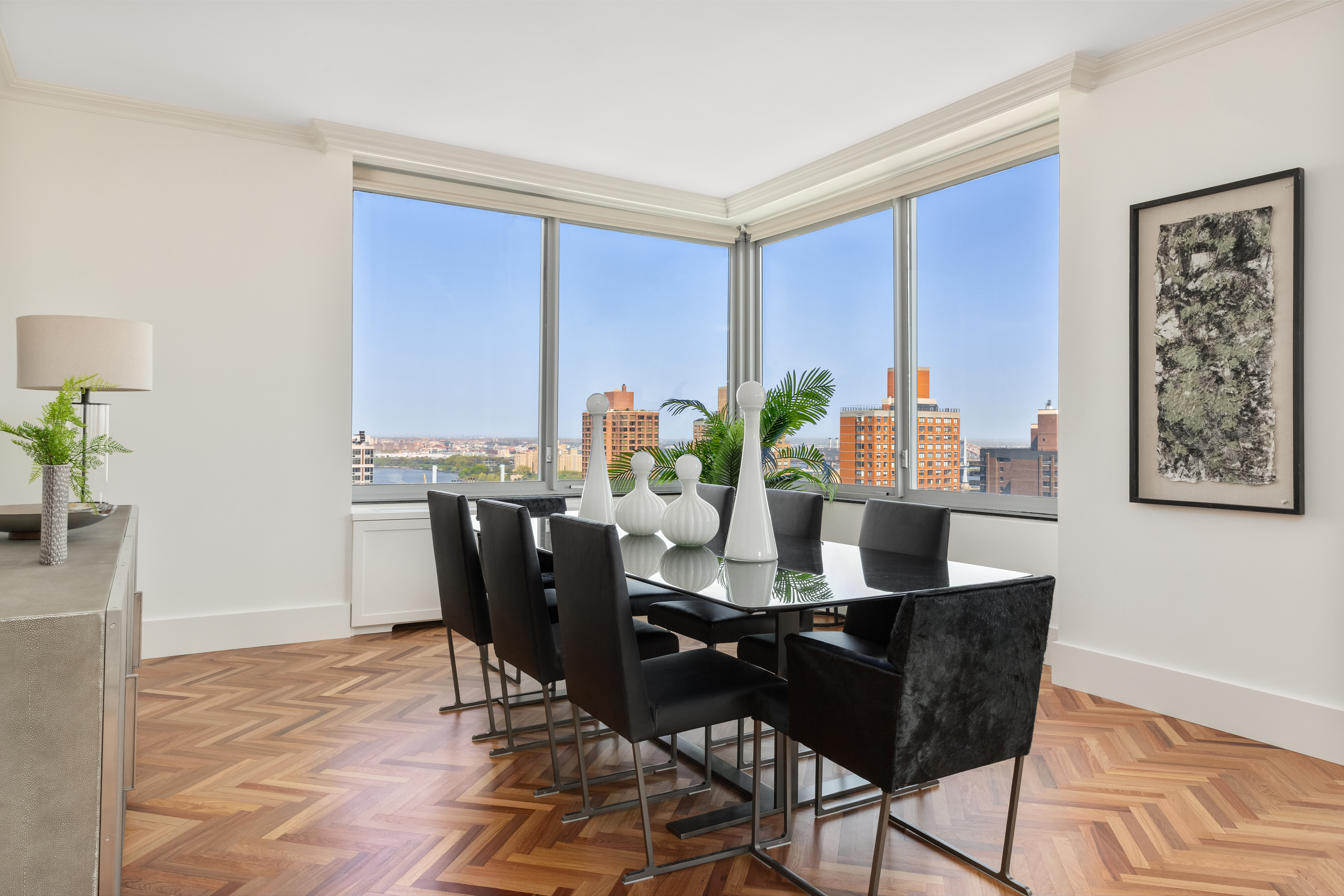 360 East 88th Street, Unit 31C Manhattan, NY 10128 - Photo 3 of 24 a view of a dining room with furniture and window