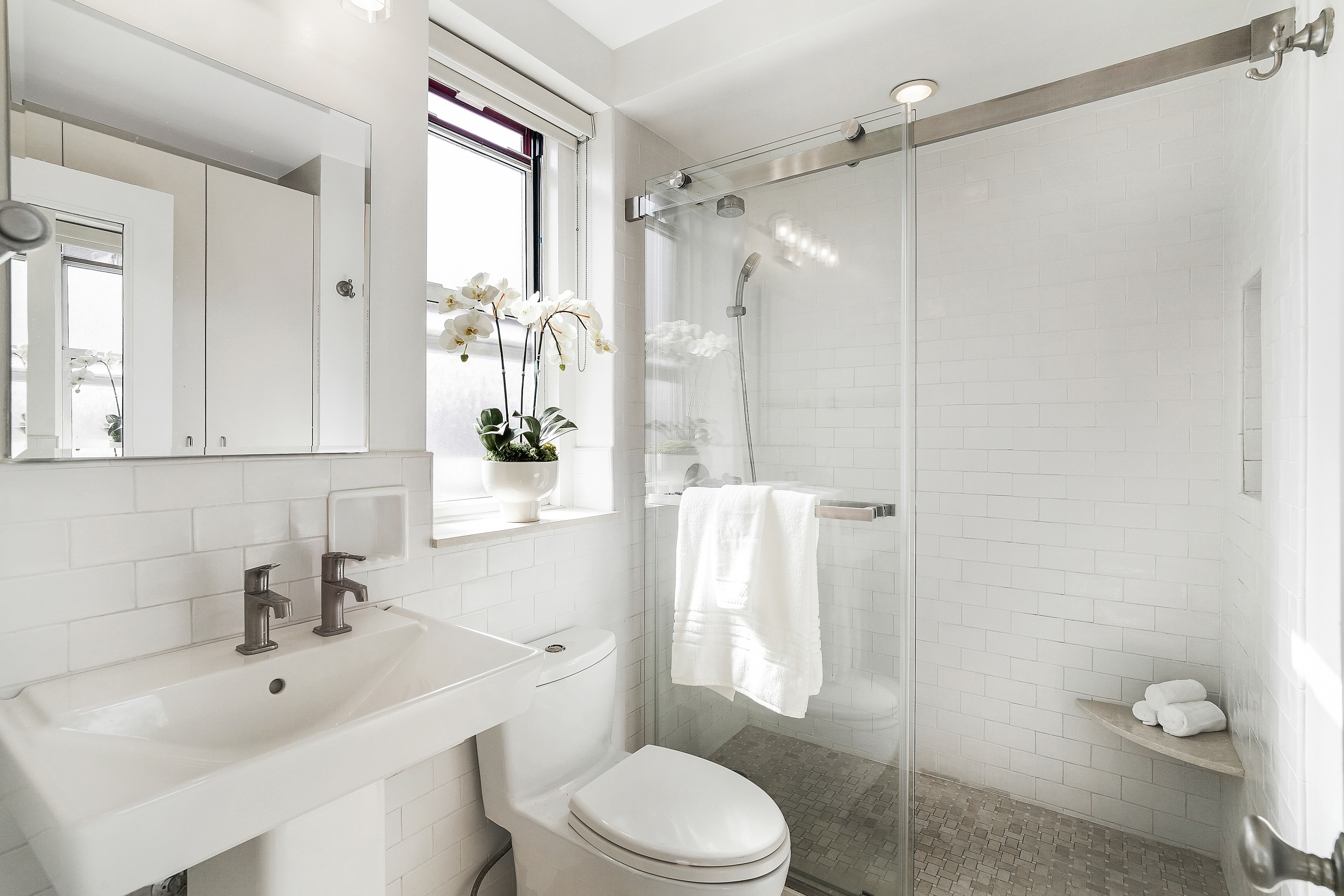 315 Riverside Drive, Unit 11B Manhattan, NY 10025 - Photo 10 of 19 a bathroom with a sink toilet and shower