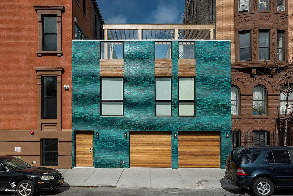 2001 5th Avenue, Unit 2 Manhattan, NY 10035 - Photo 5 of 9 a couple of cars parked in front of brick building
