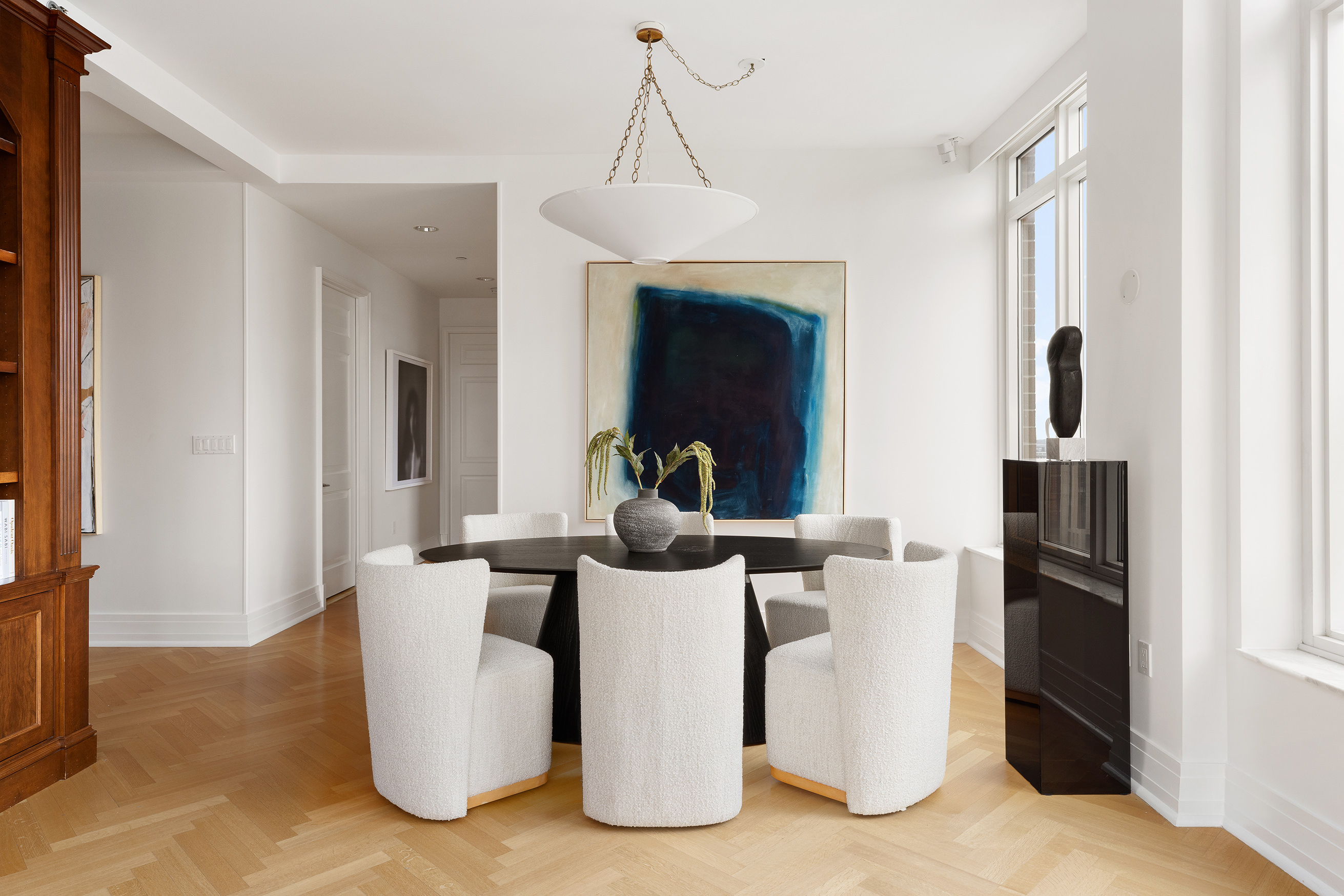 205 East 85th Street, Unit 19B Manhattan, NY 10028 - Photo 2 of 9 a living room with fireplace furniture and a window