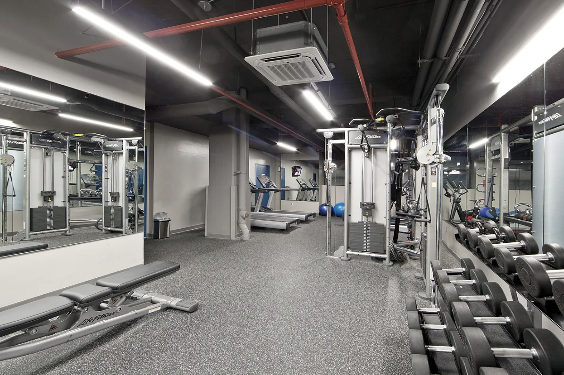 44 Berry Street, Unit 3A Brooklyn, NY 11249 - Photo 7 of 8 a view of a room with gym equipment