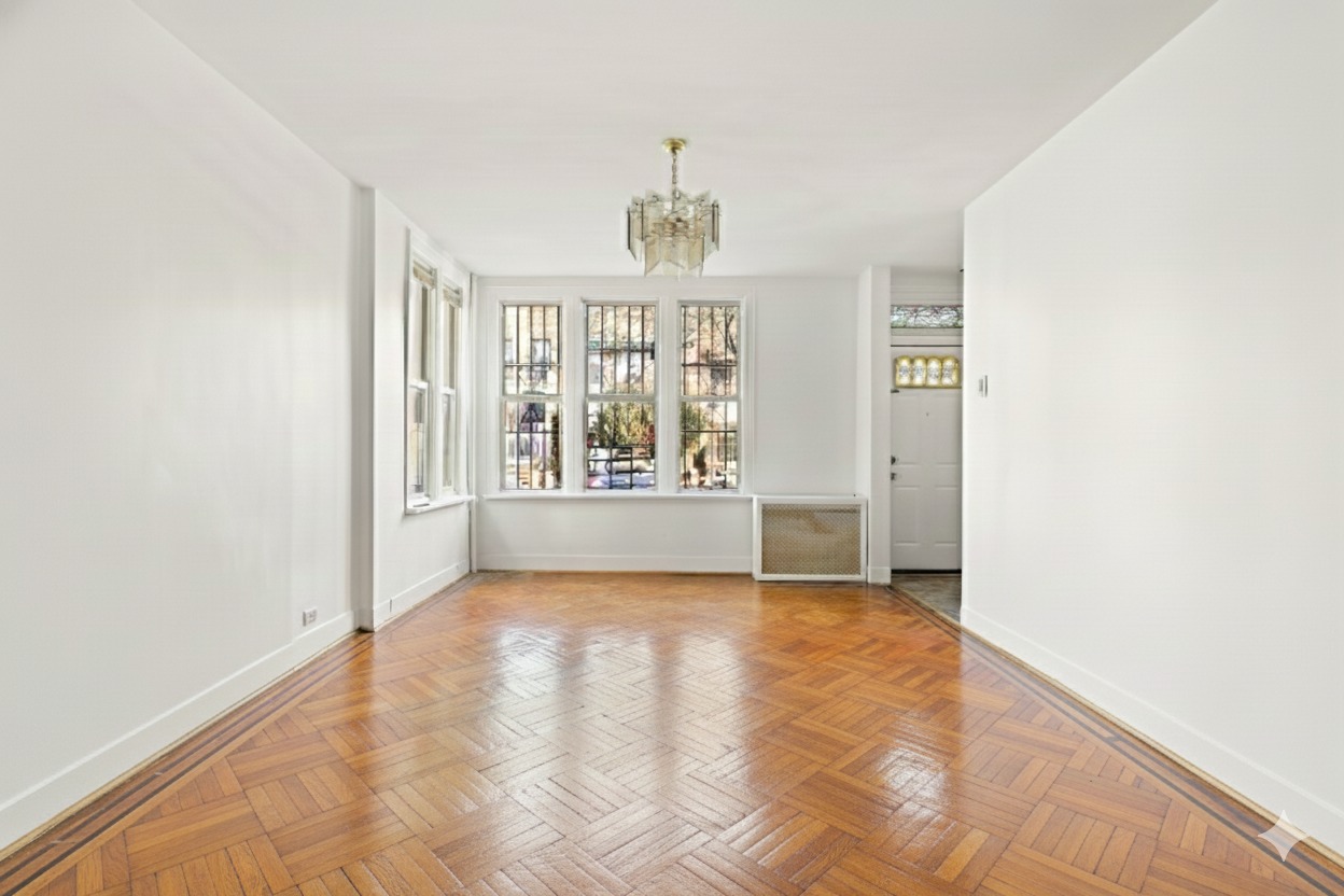 742 44th Street Brooklyn, NY 11220 - Photo 12 of 23 a view of an empty room with a window