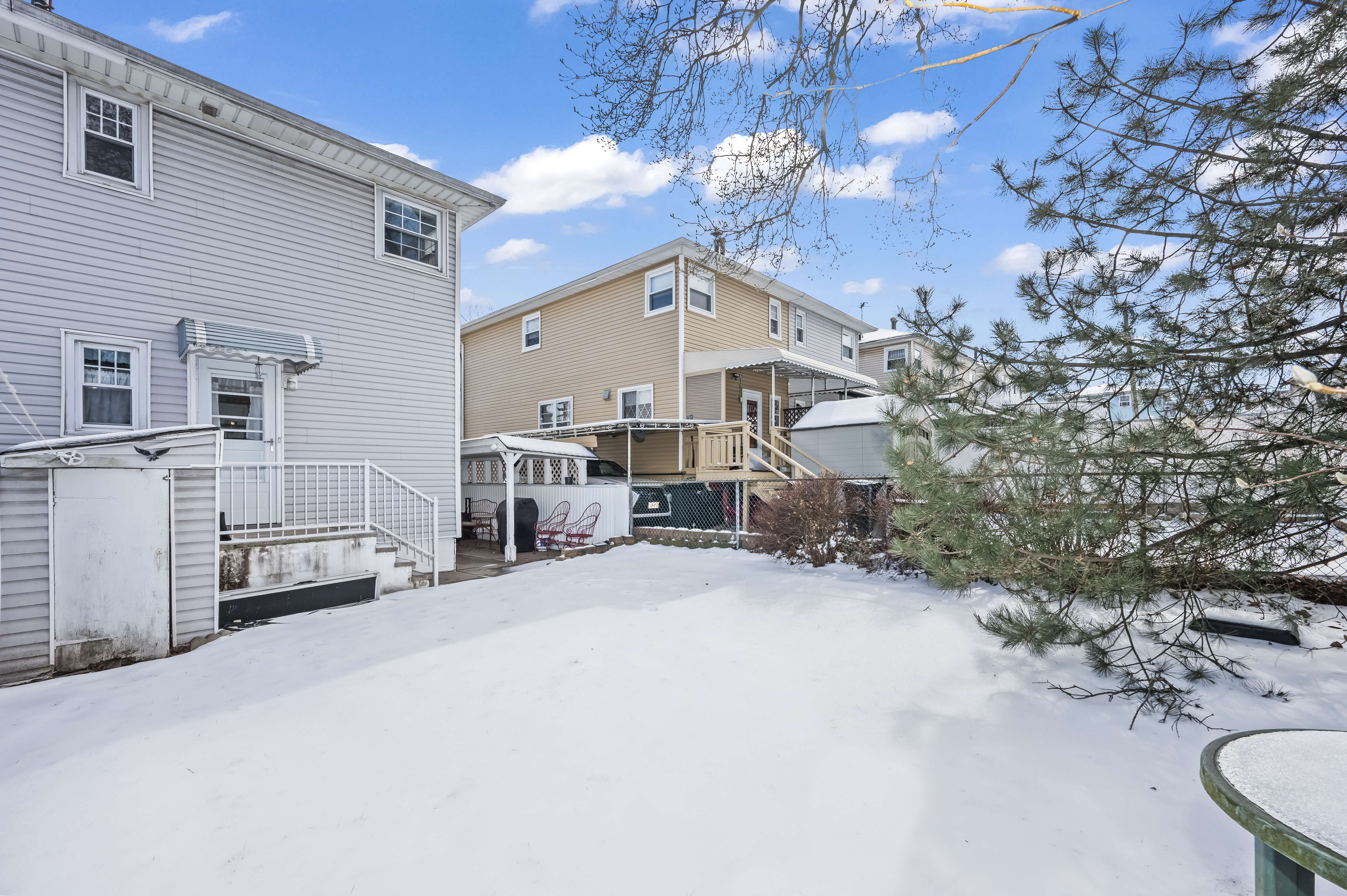 15 Area Place Staten Island, NY 10314 - Photo 22 of 27 a view of a house with a patio