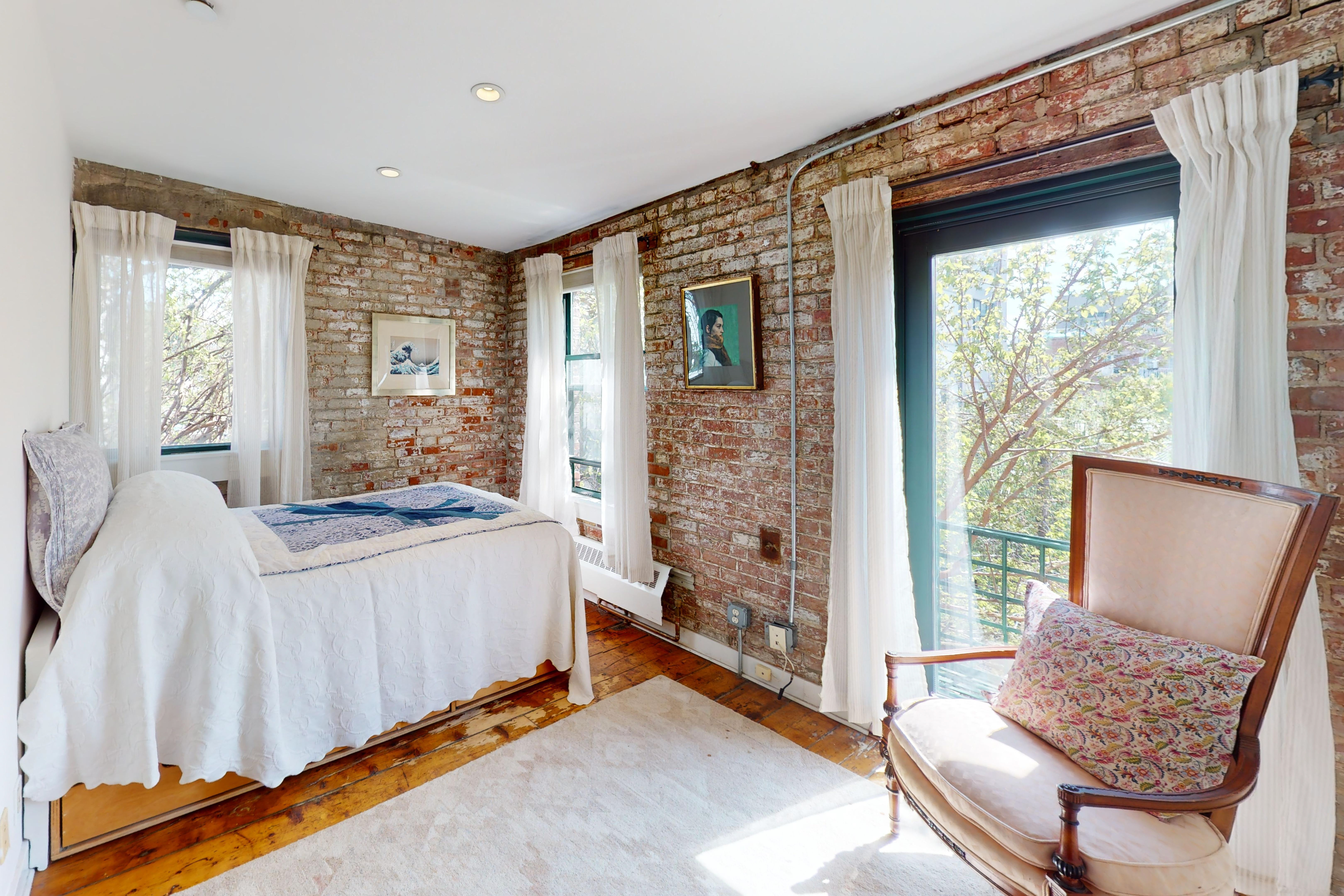 248 17th Street, Unit 6 Brooklyn, NY 11215 - Photo 11 of 21 a bedroom with a bed and wooden floor