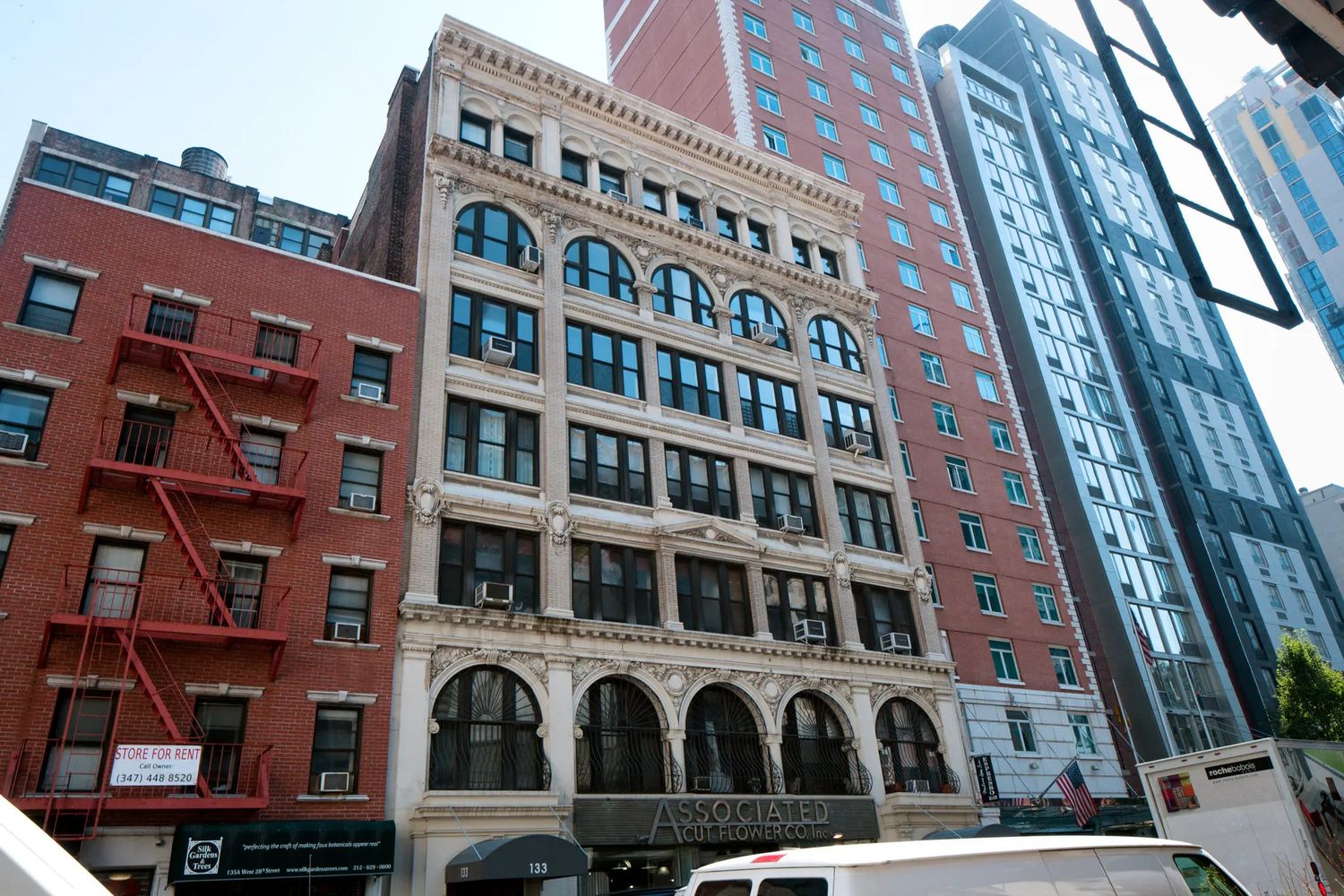 133-131 West 28th Street, Unit 7A Manhattan, NY 10001 - Photo 10 of 11 a front view of a building