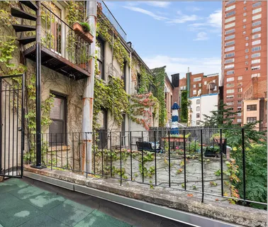 a city street lined with tall buildings