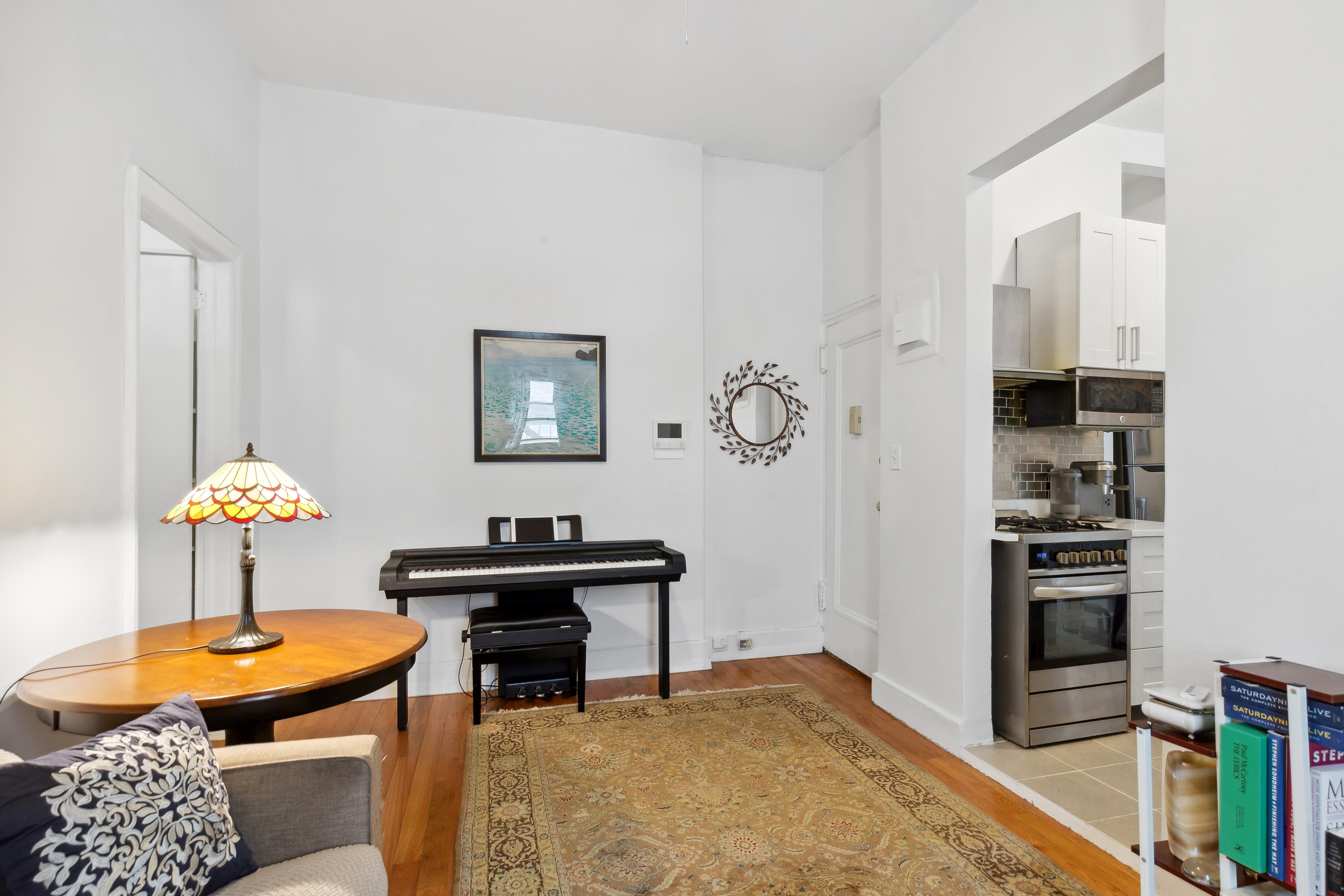 244 Riverside Drive, Unit 6K Manhattan, NY 10025 - Photo 4 of 8 a livingroom with furniture and rug