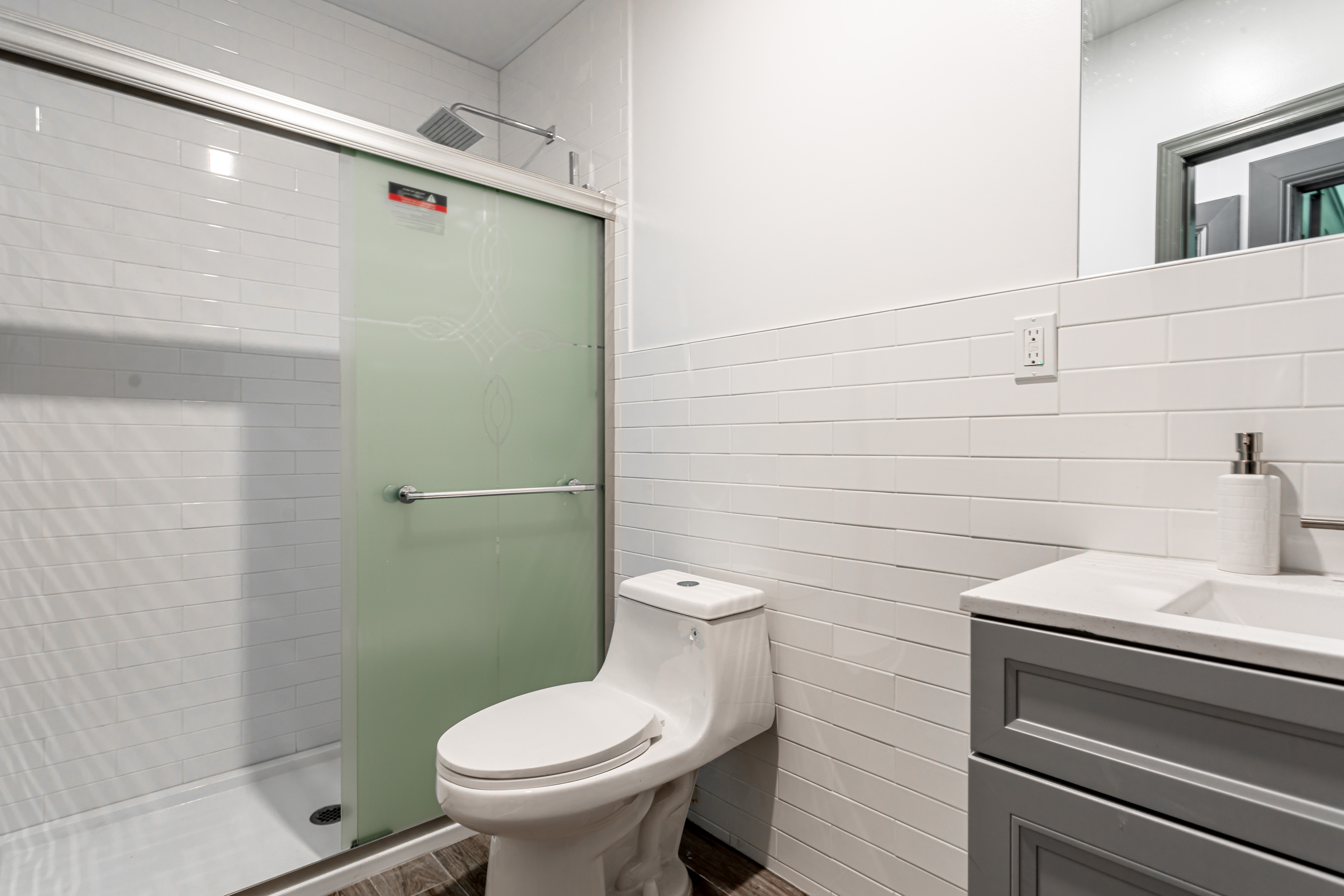 1191 Lincoln Place, Unit 1 Brooklyn, NY 11213 - Photo 9 of 13 a bathroom with a toilet and a sink