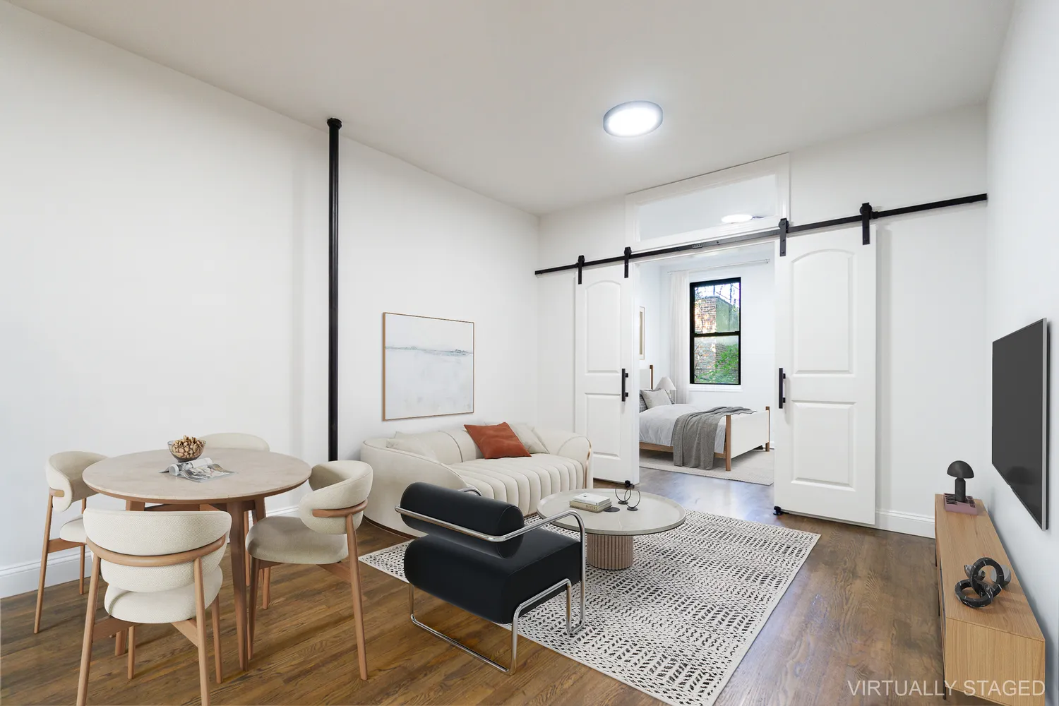 a living room with furniture and a flat screen tv