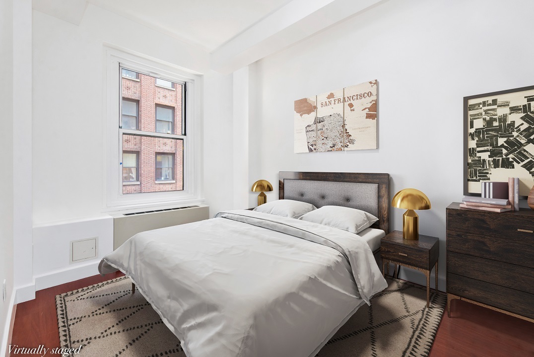 80 John Street, Unit 5G Manhattan, NY 10038 - Photo 5 of 8 a bedroom with bed and a window