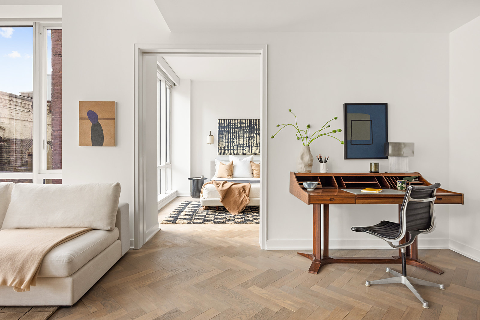 330 Spring Street, Unit 7D Manhattan, NY 10013 - Photo 8 of 11 a workspace with furniture and a window