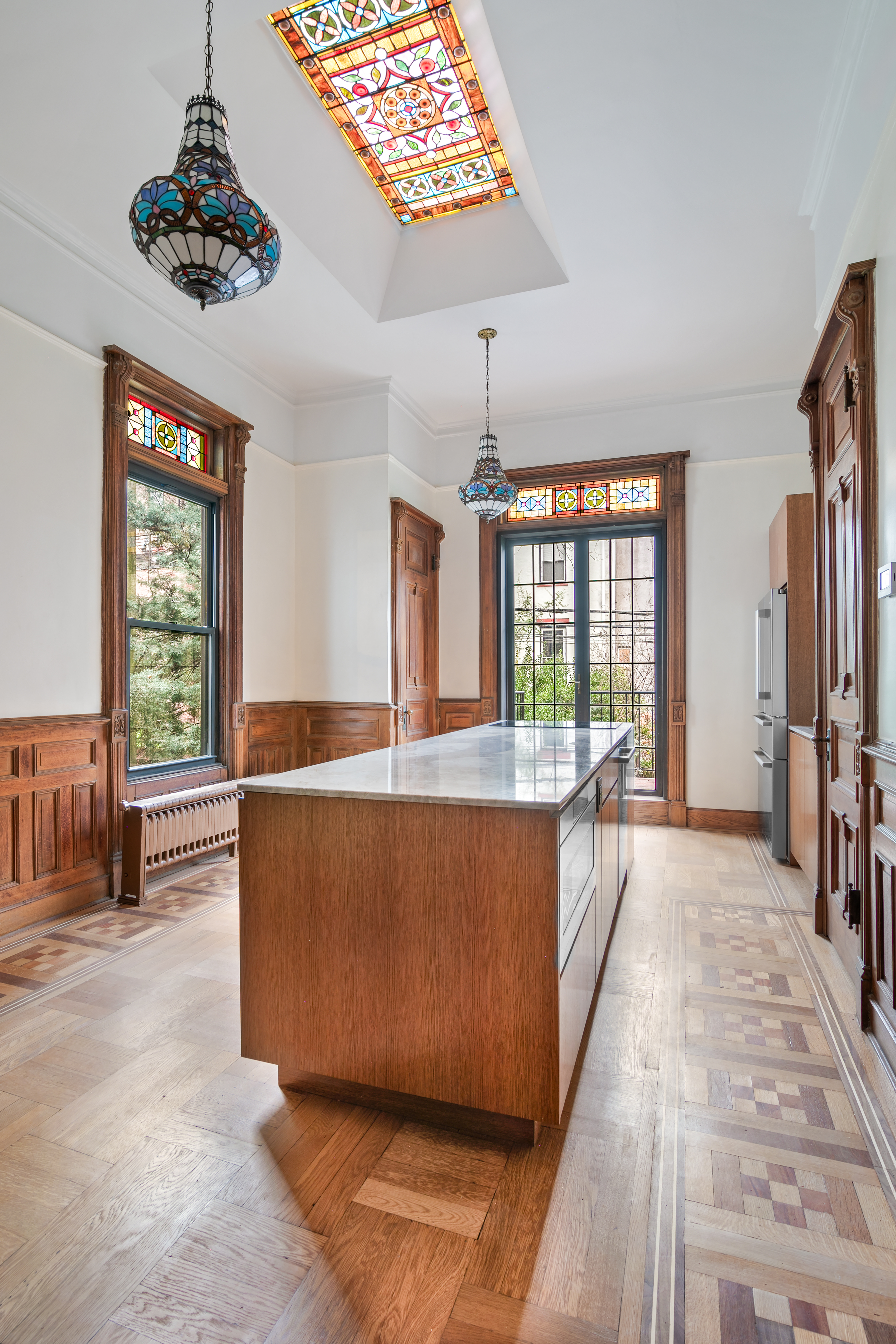 914 President Street, Unit TWNHSE Brooklyn, NY 11215 - Photo 7 of 29 a living room with furniture and a large window