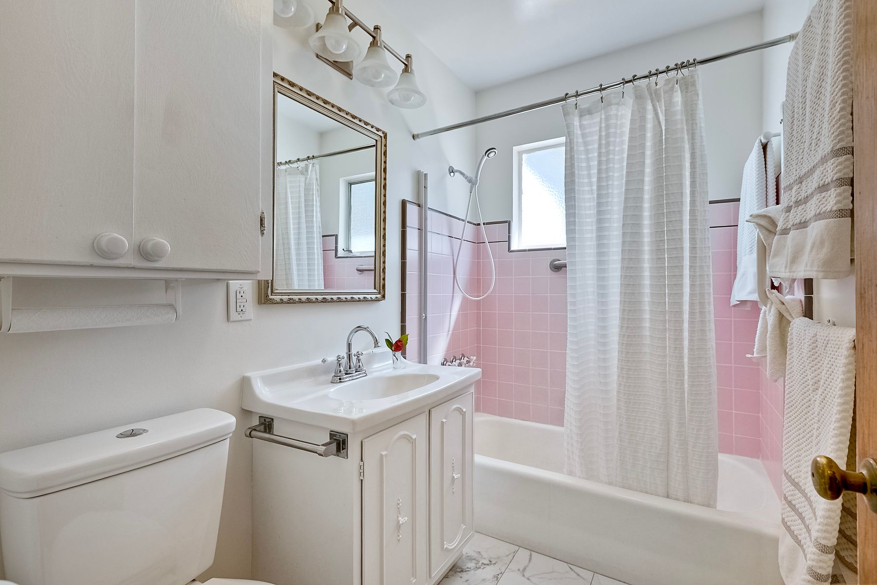 534 Hoover Street Oceanside, CA 92054 - Photo 19 of 31 a bathroom with a sink toilet and shower